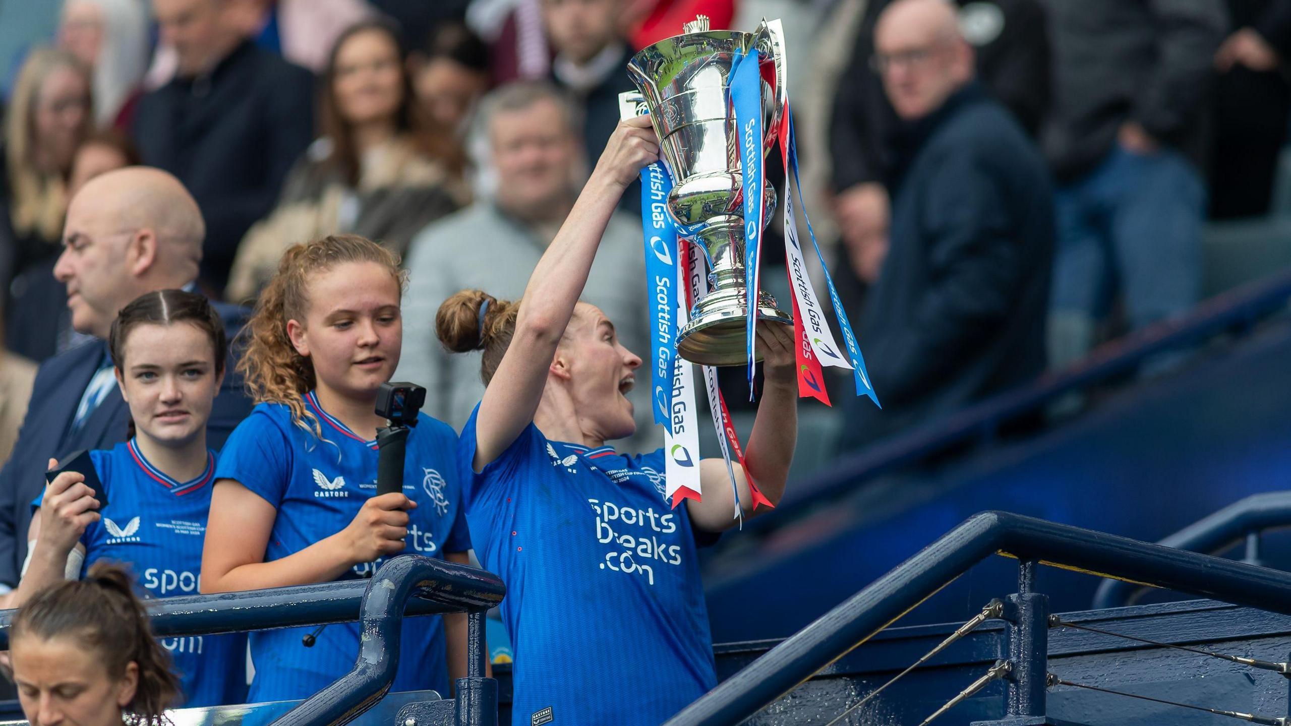 Rachel Rowe lifts the Scottish Cup