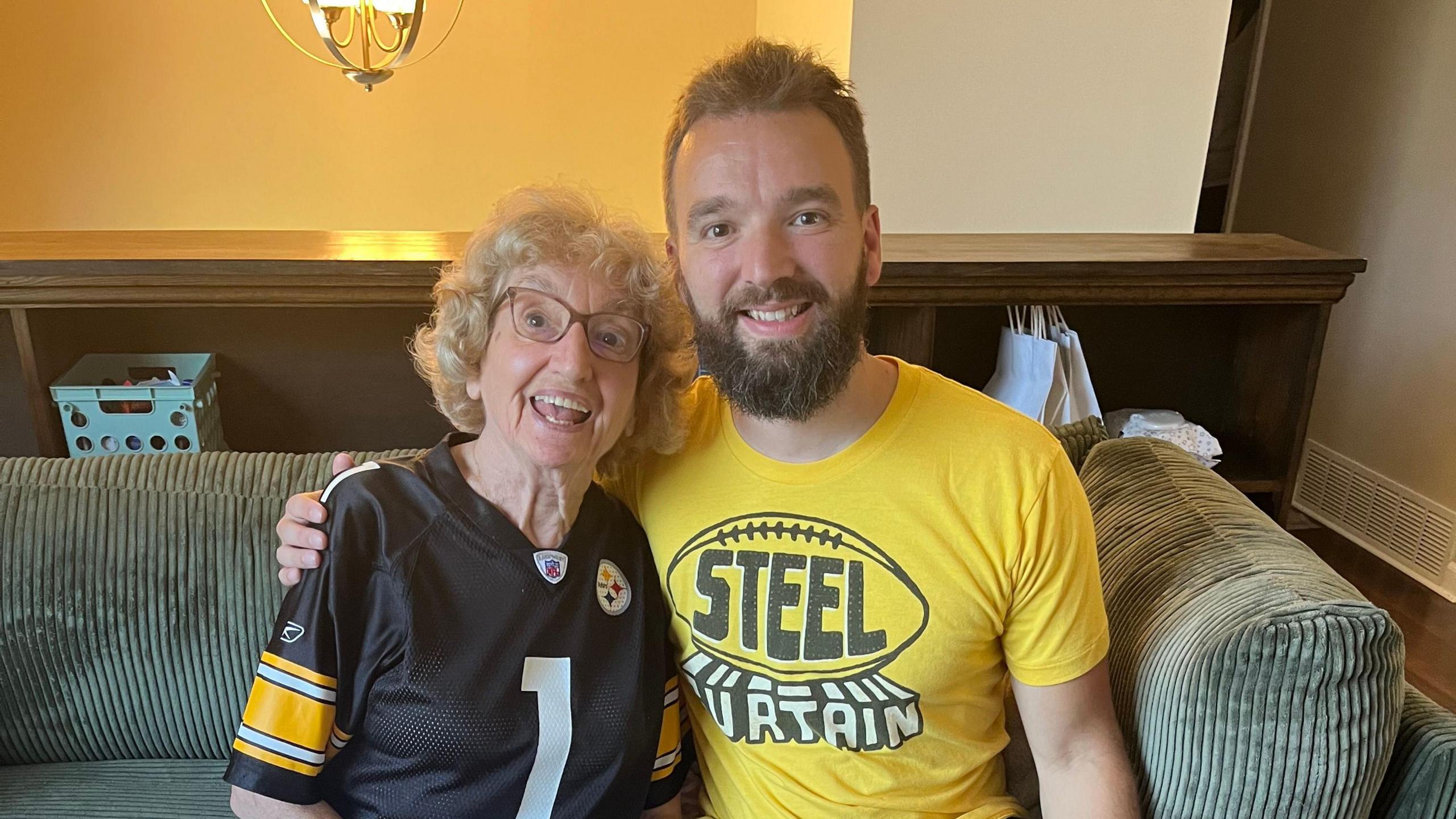 Tim Anzelone with his grandmother at the Steelers party