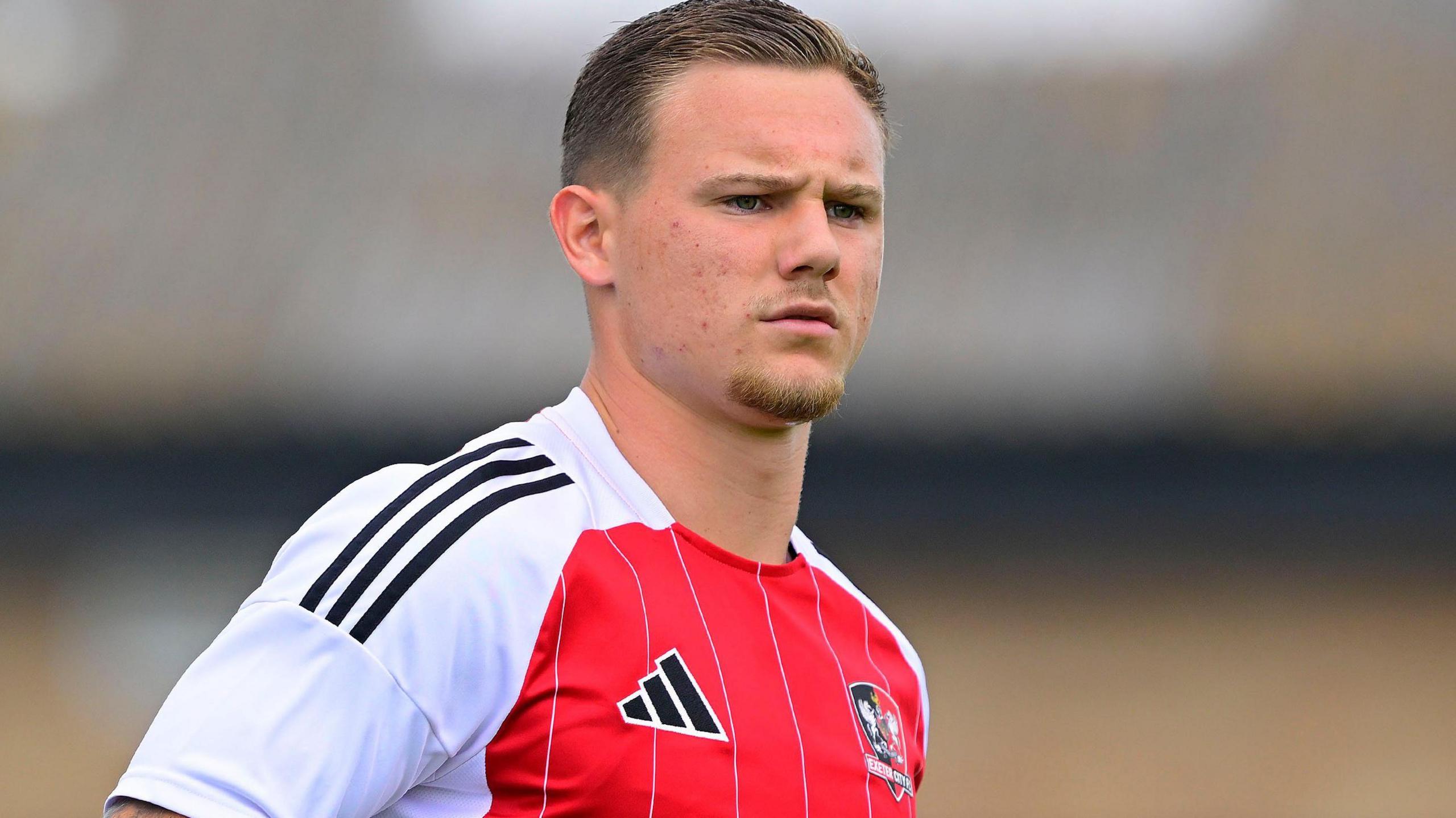 Jayden Wareham in action for Exeter City