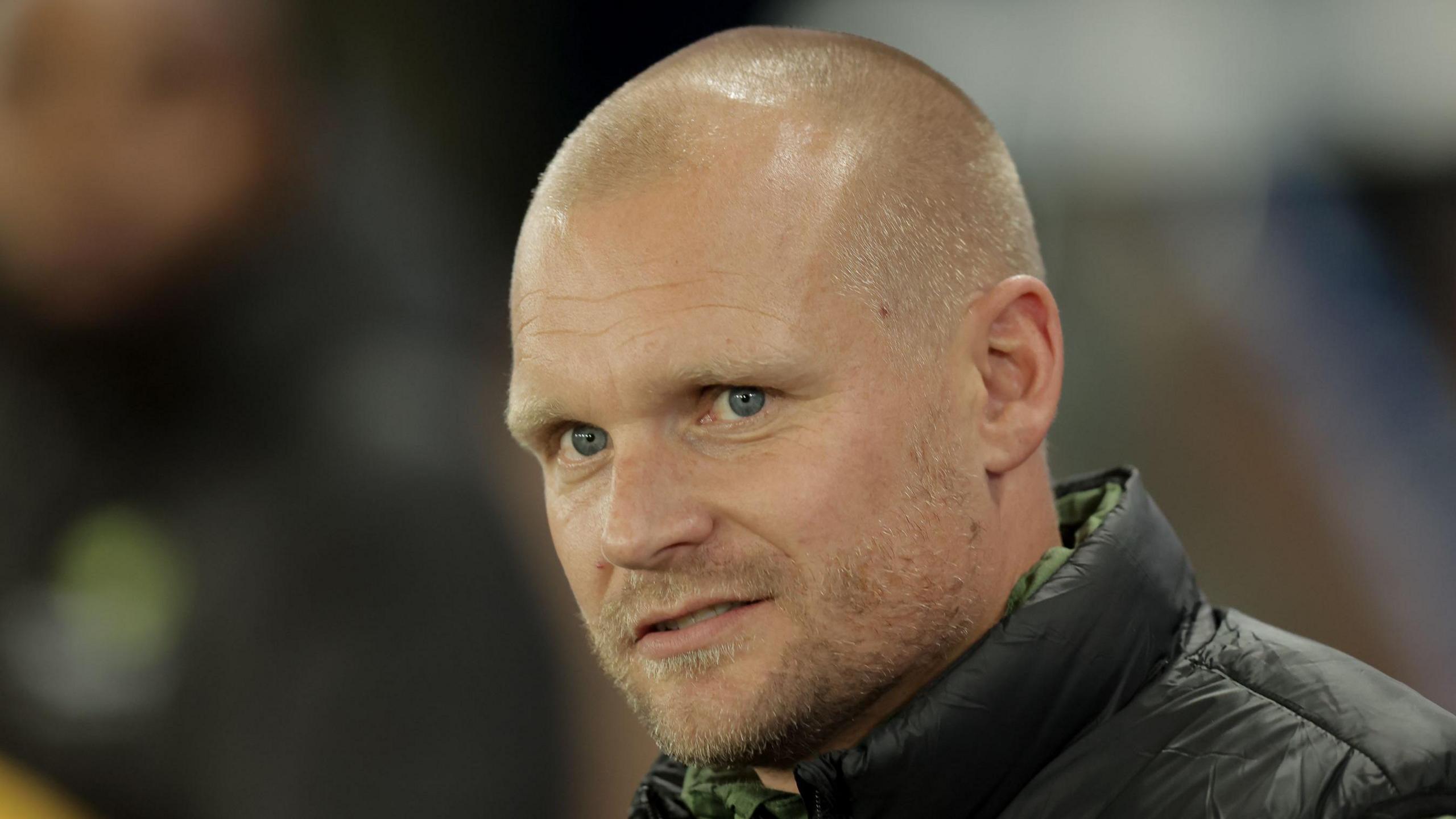 Liam Manning looks on during his time in charge of Norwich City this season