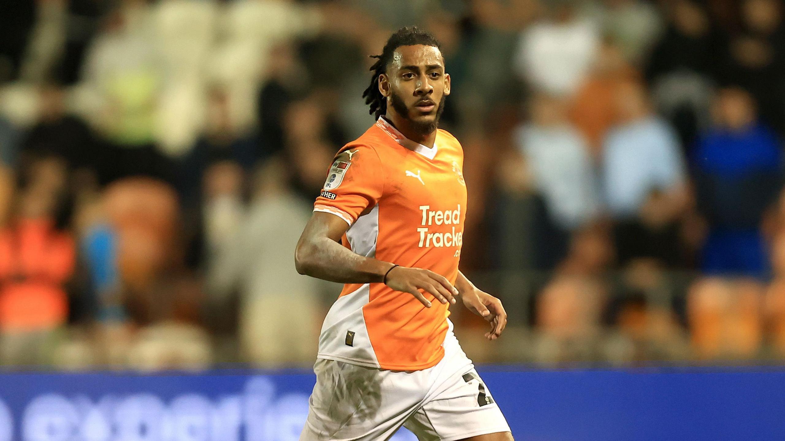 Dominic Thompson in action for Blackpool