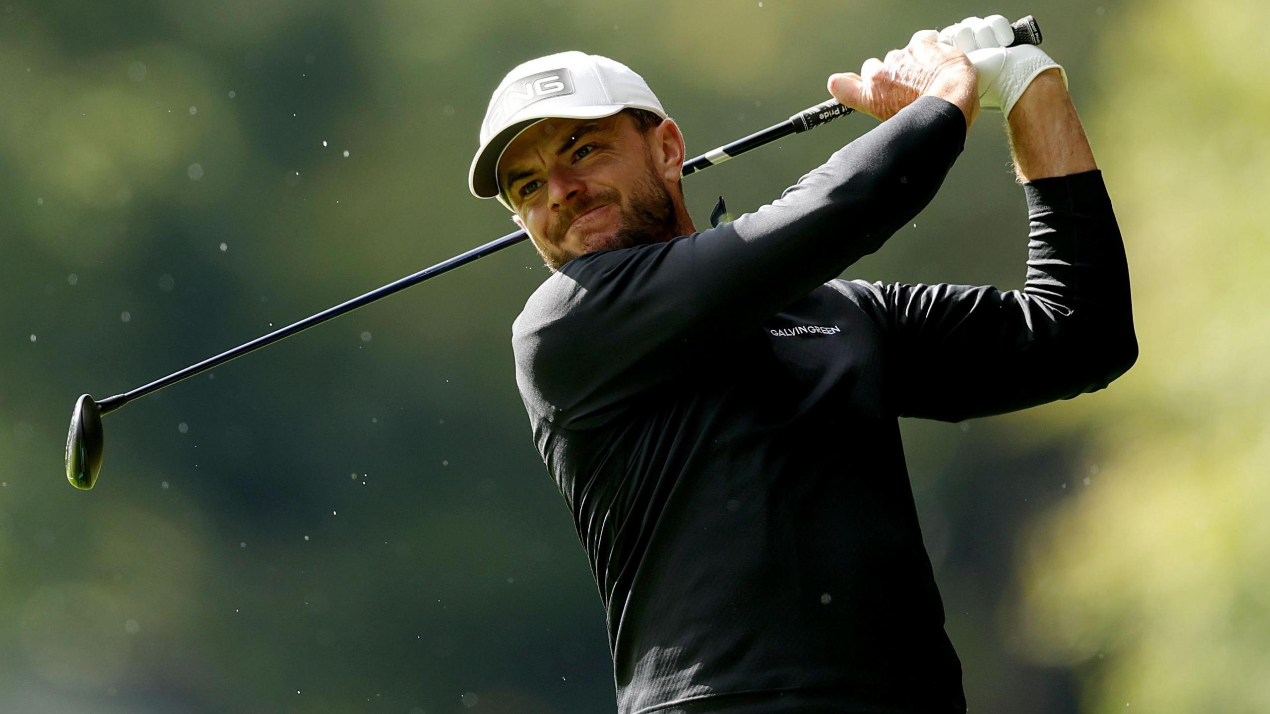 Laurie Canter grimaces after an iron shot