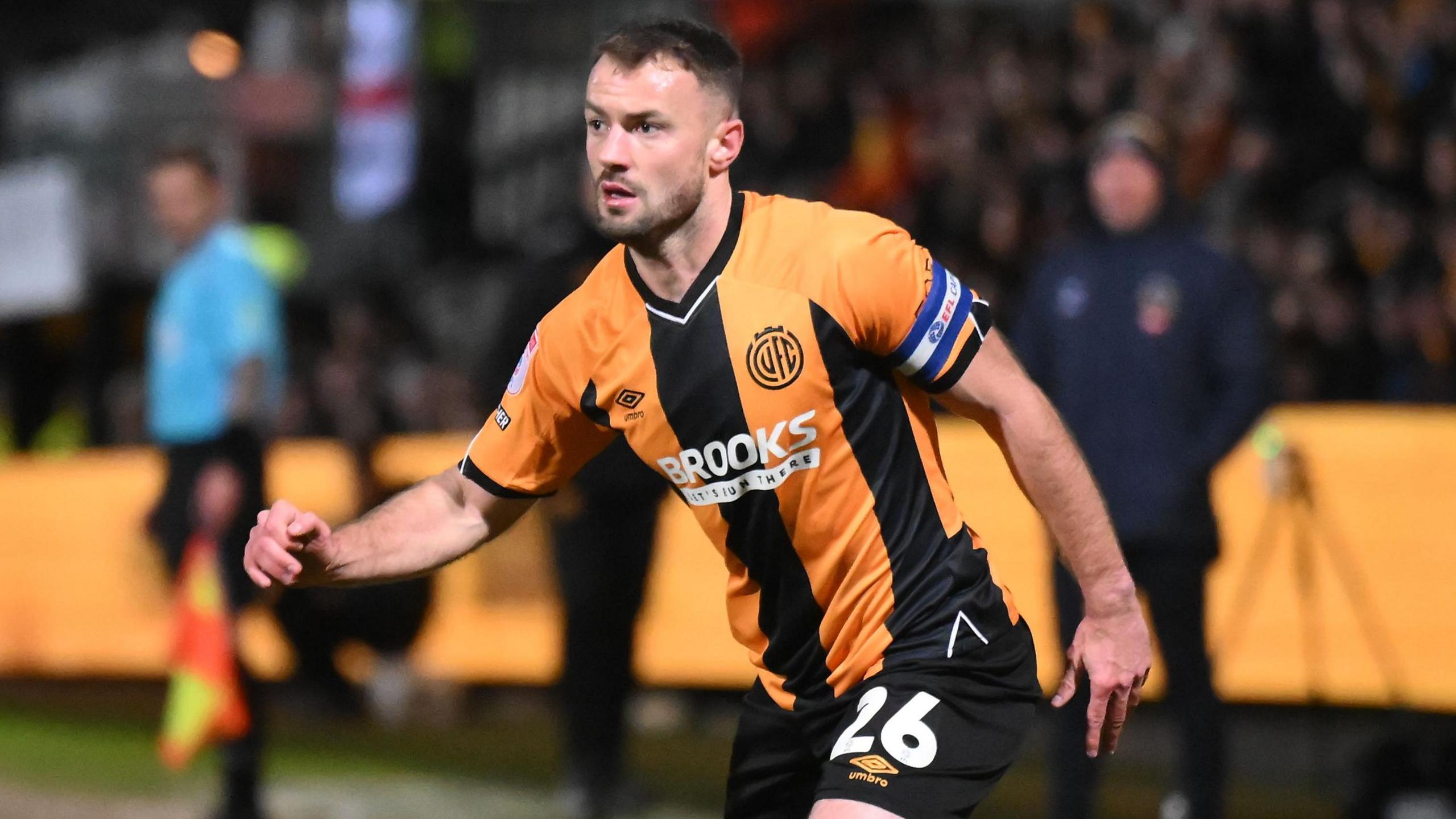 James Gibbons playing for Cambridge United