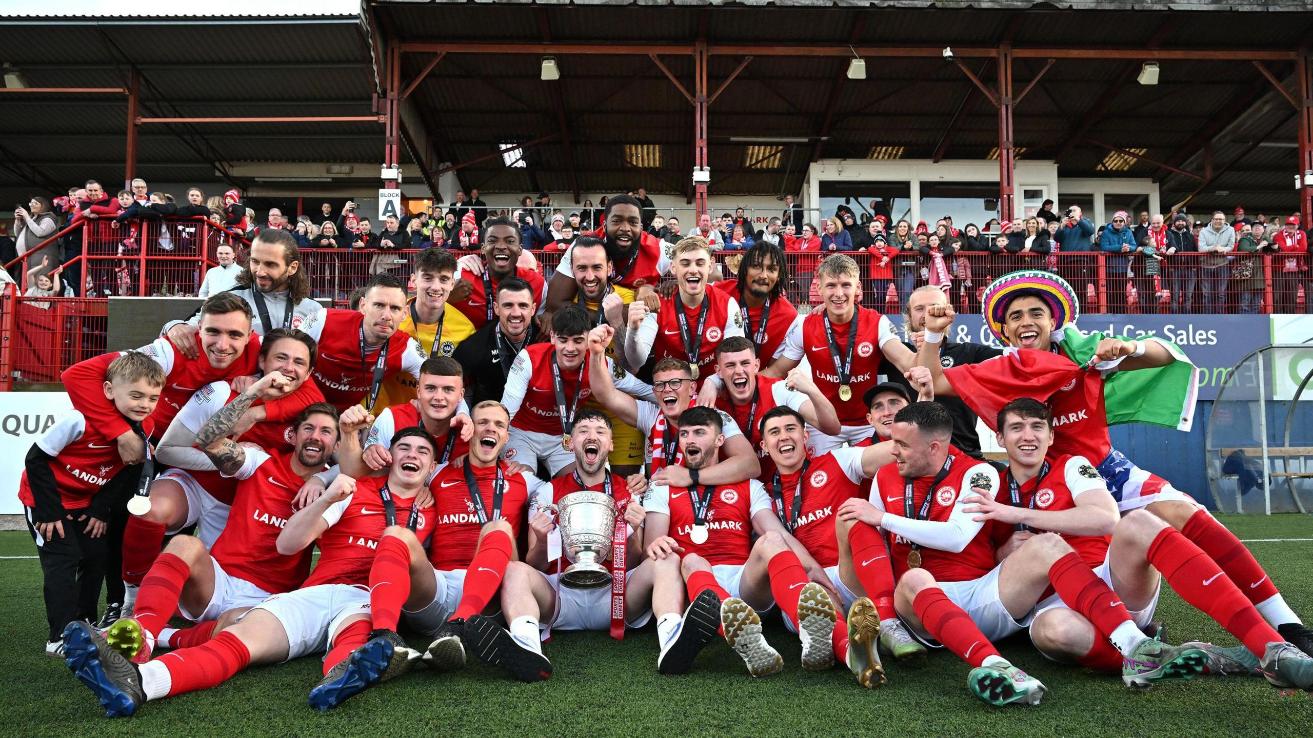 Larne celebrate lifting the Gibson Cup