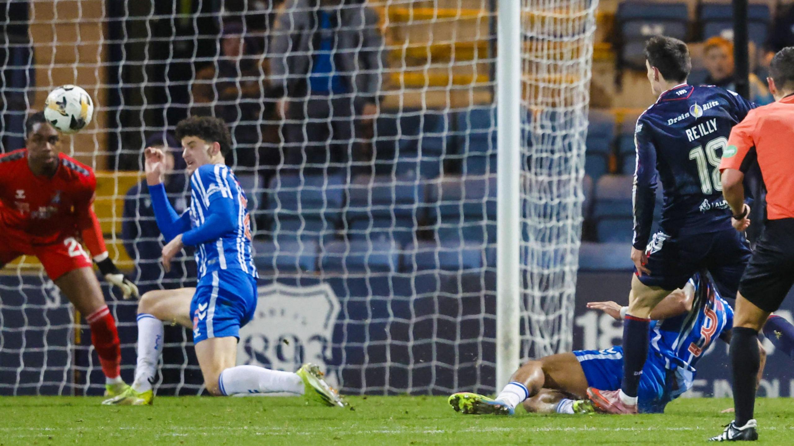 Charlie Reilly bends in the winner