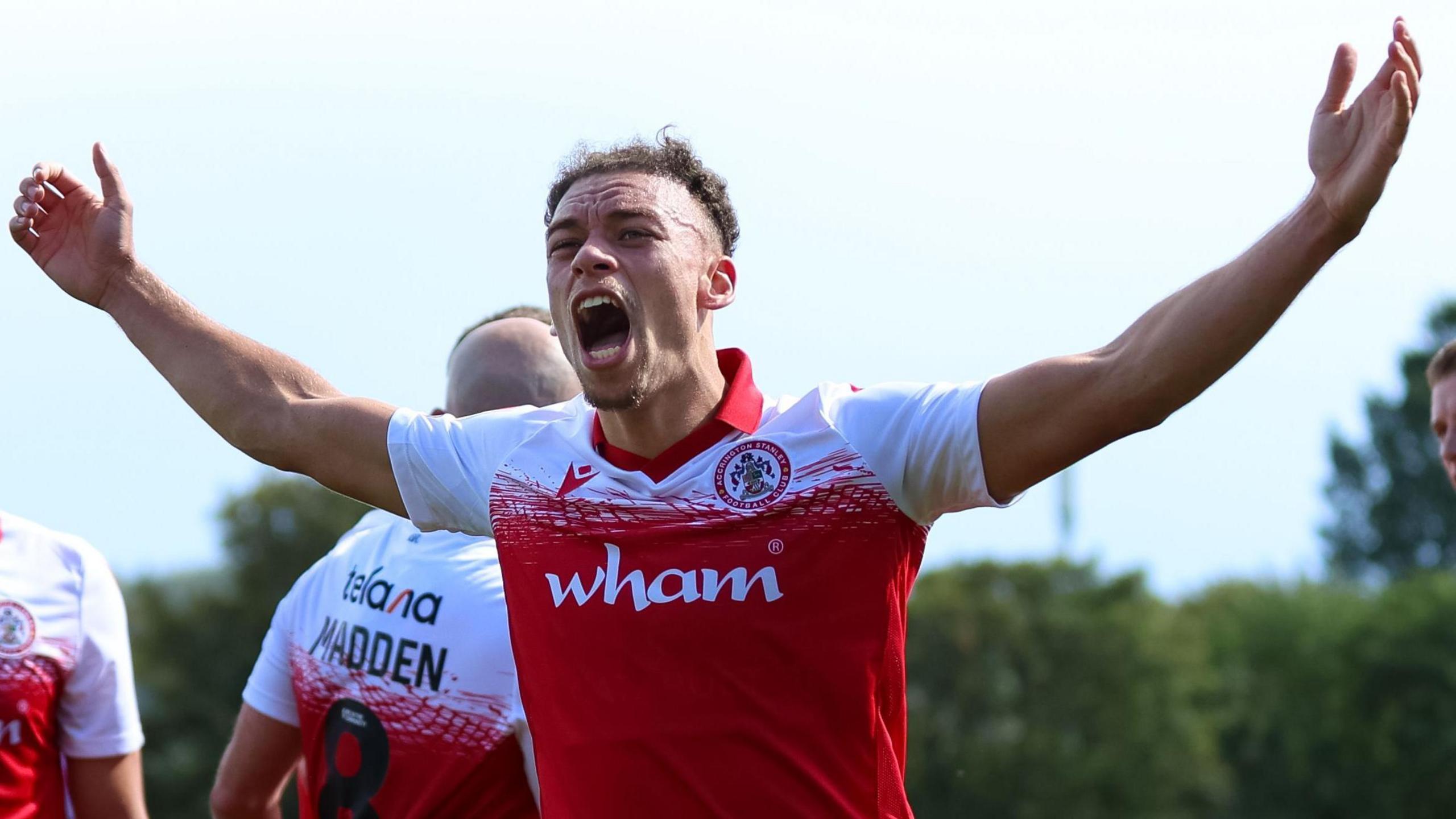 Isaac Sinclair of Accrington Stanley celebrates