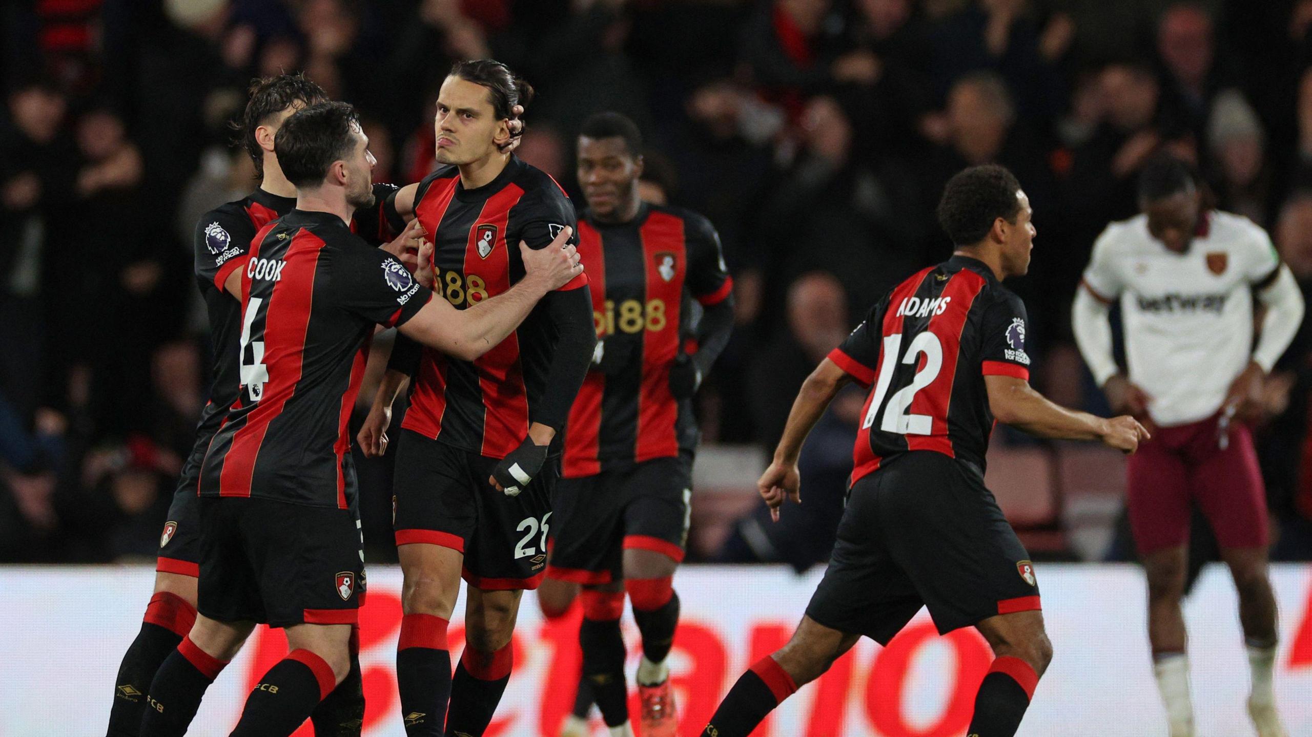 Enes Unal celebrates