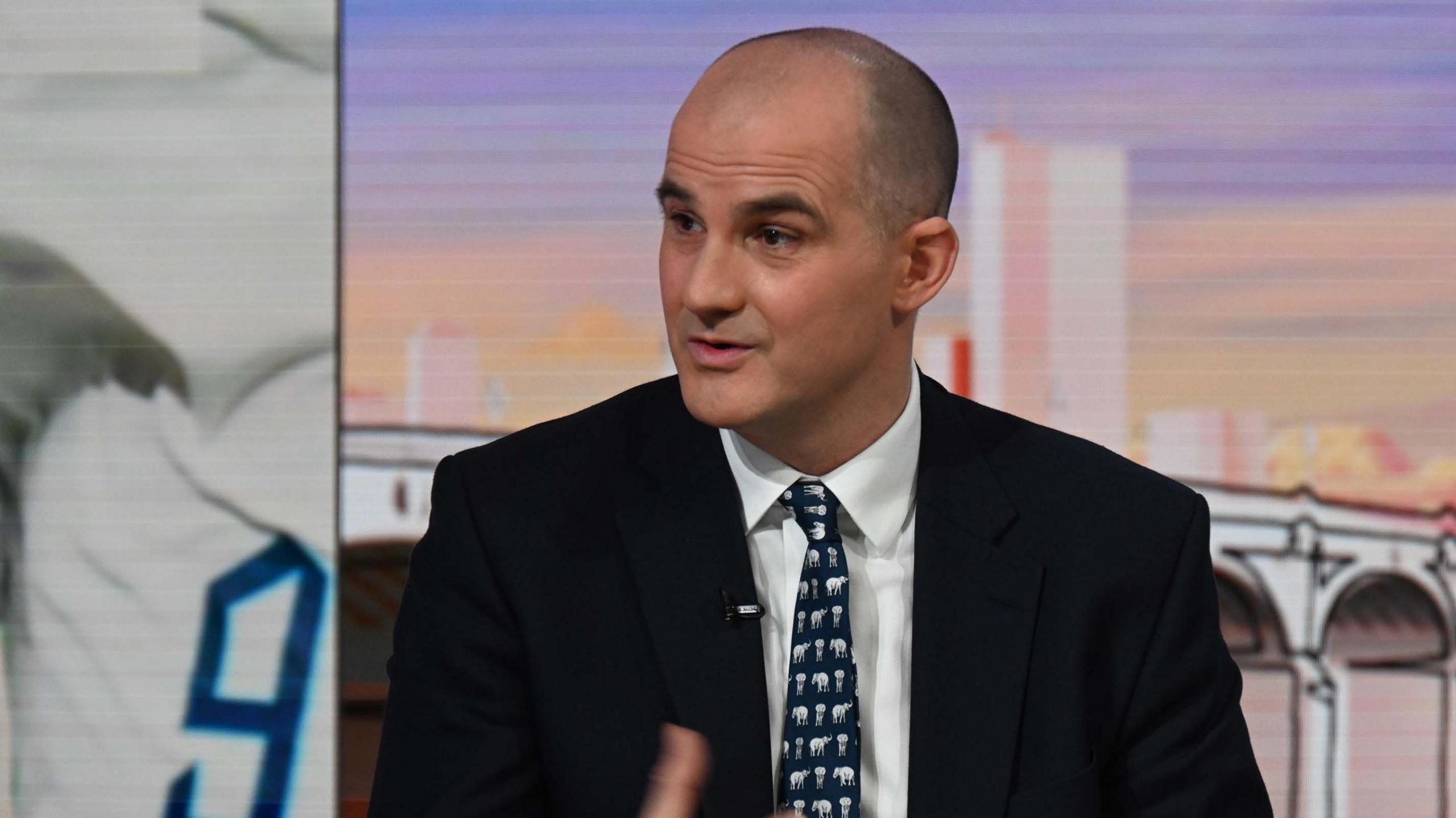 Jake Berry wearing a black suit and a black and white tie on the Sunday with Laura Kuenssberg programme