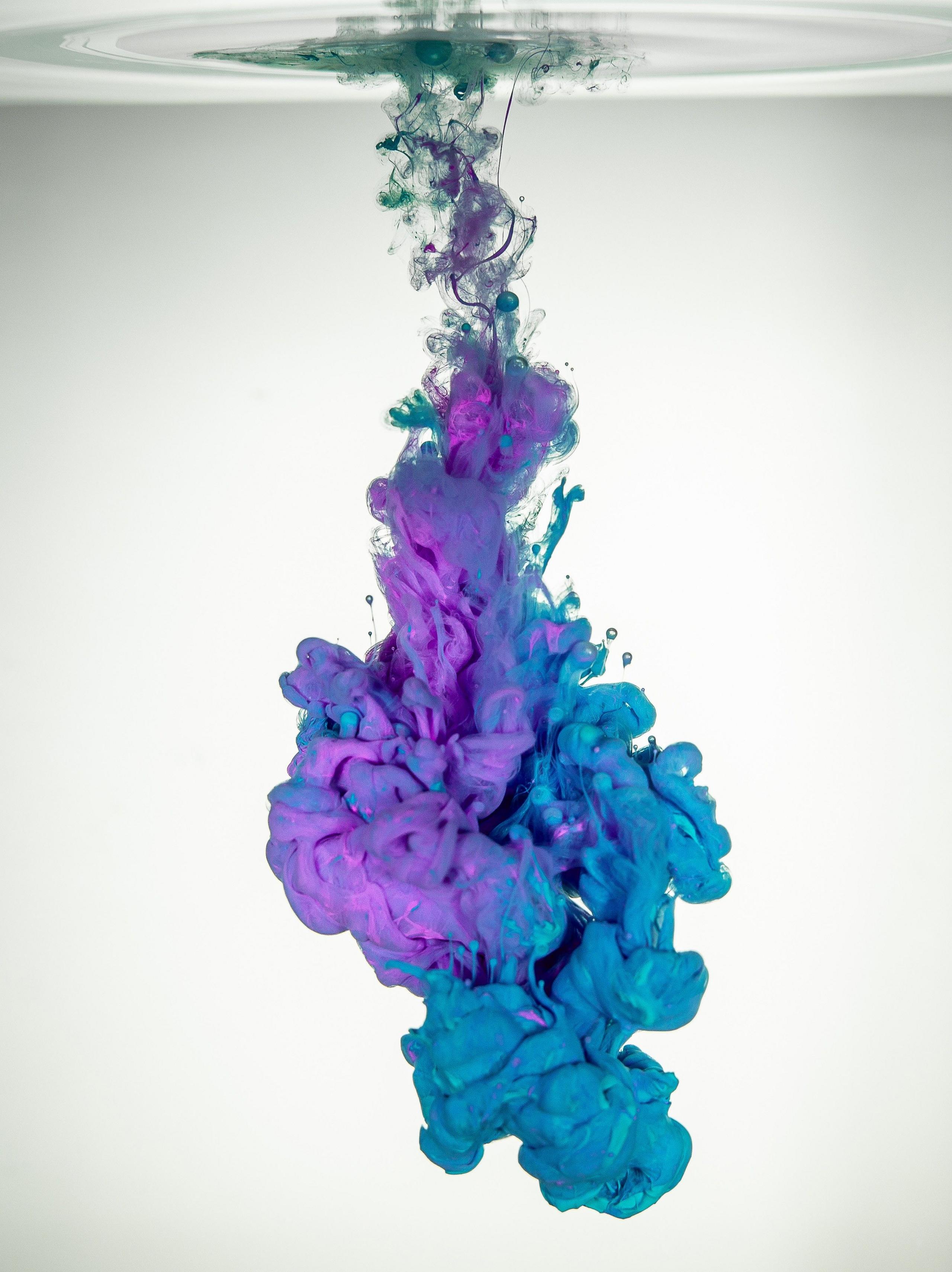 Coloured fluids mixing in water