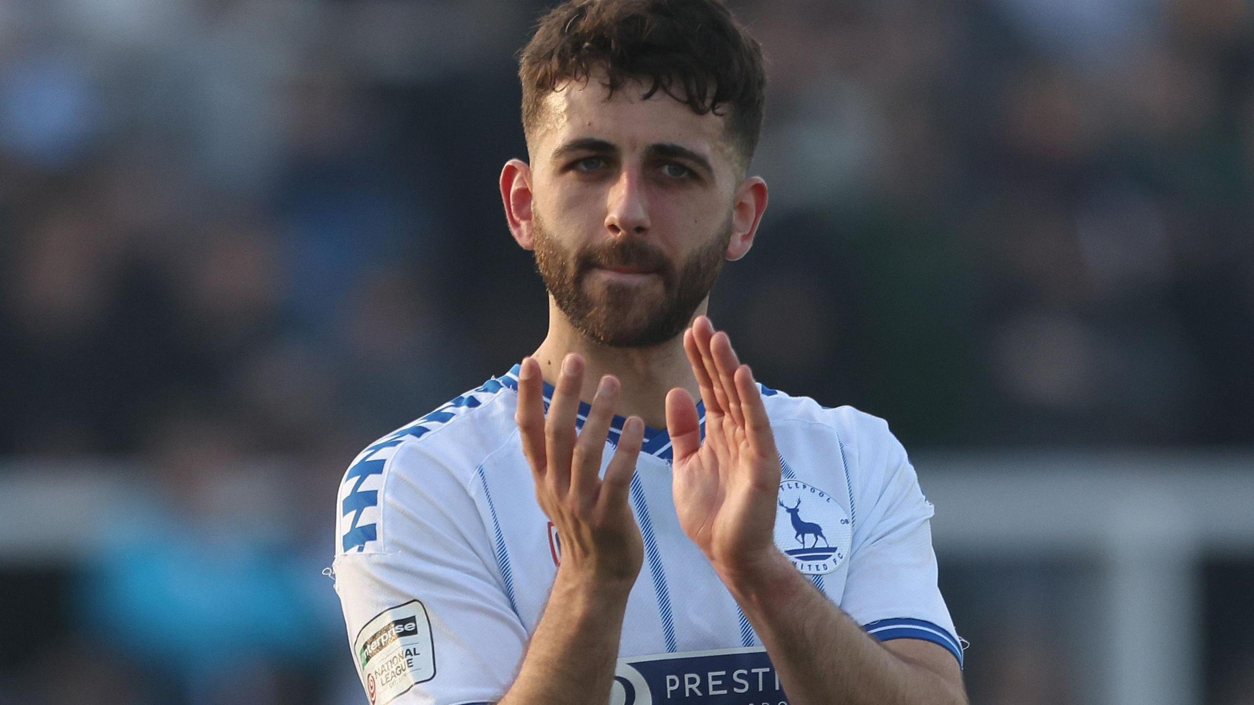 Jack Hunter claps the Hartlepool United fans
