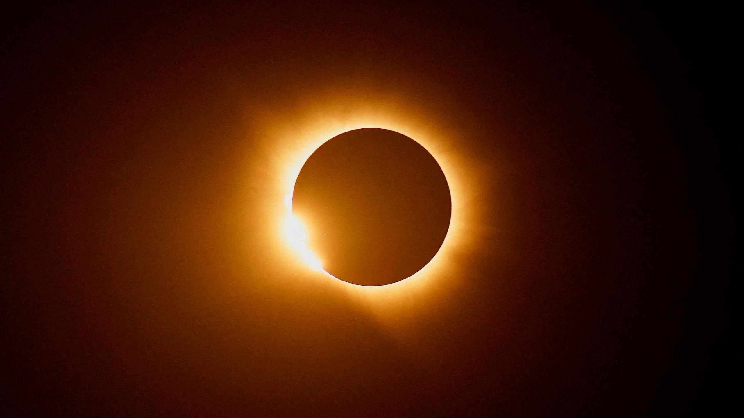 The moon partially covers the sun during a solar eclipse as seen from Villalba del Rey, Spain.