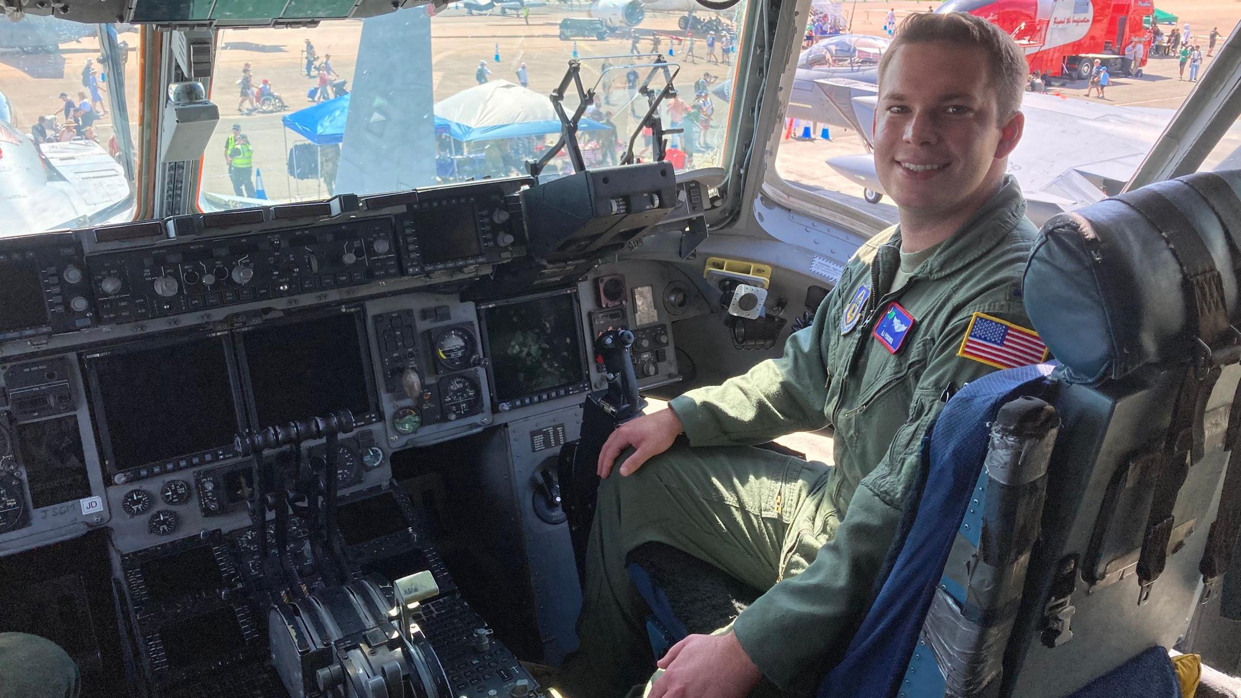 2nd Lieutenant AJ Fischer of the US airforce in the cockpit of a US C-17