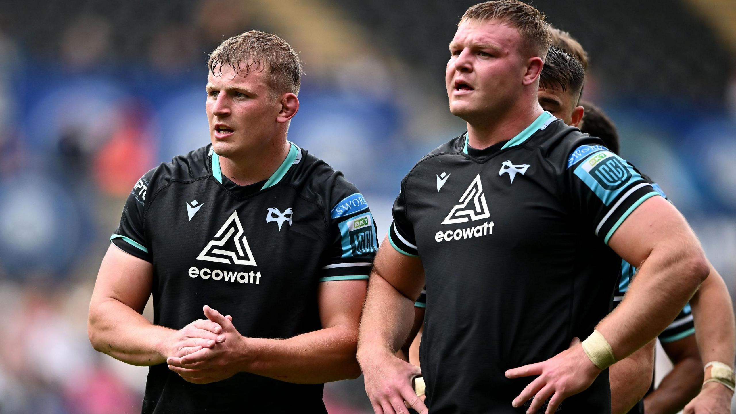 Jac Morgan, left, and Dewi Lake, right, stand together while playing for Ospreys