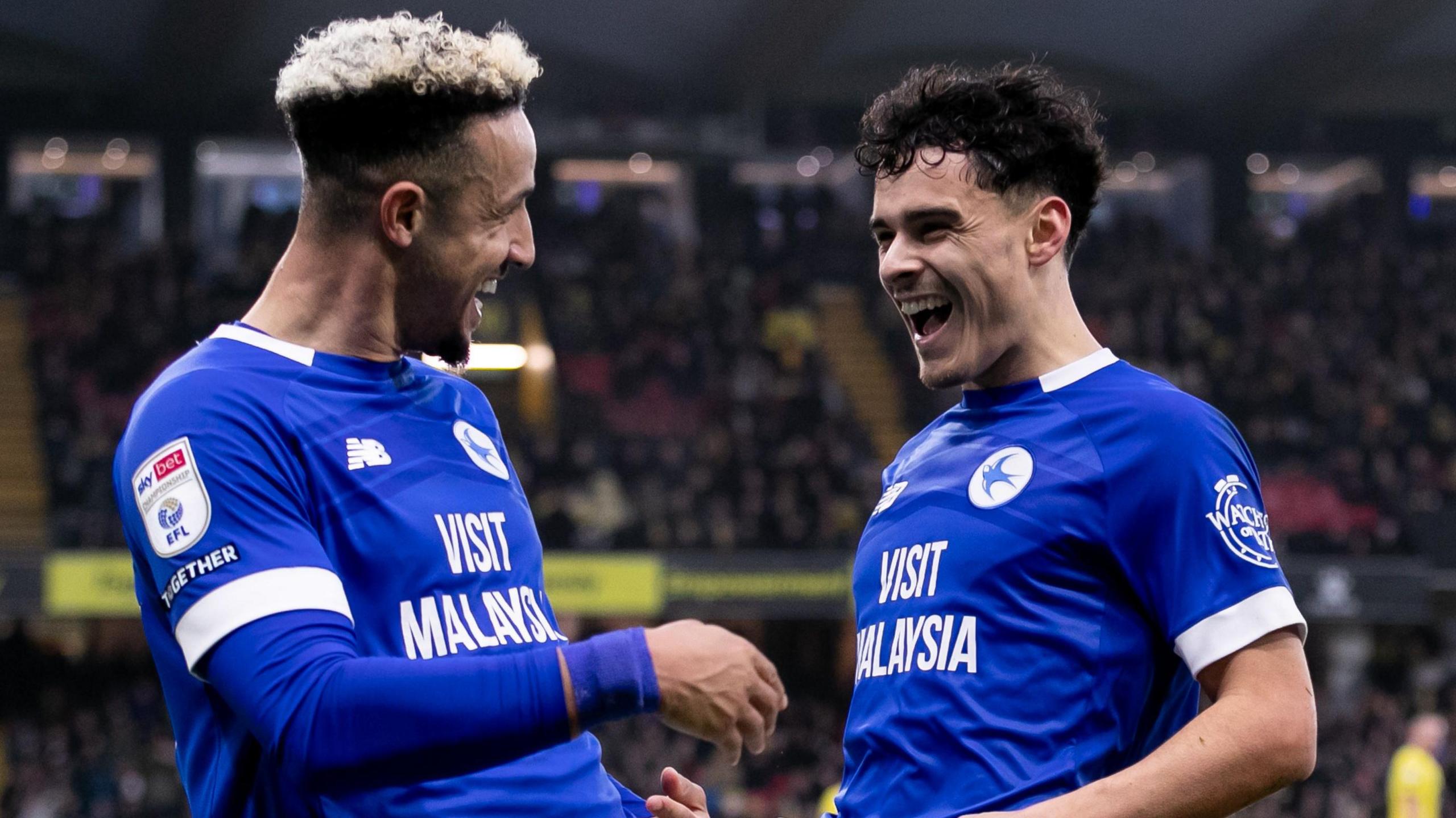 Cardiff City's Callum Robinson (left) and Alex Robertson (right)