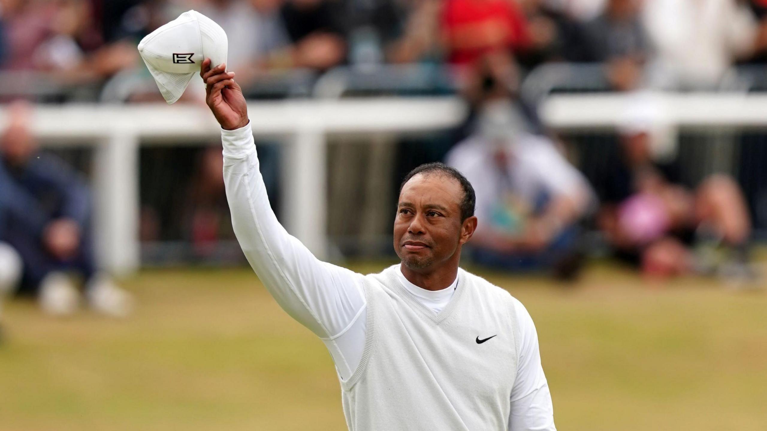 Tiger Woods acknowledges the crowds at the Open in 2022 