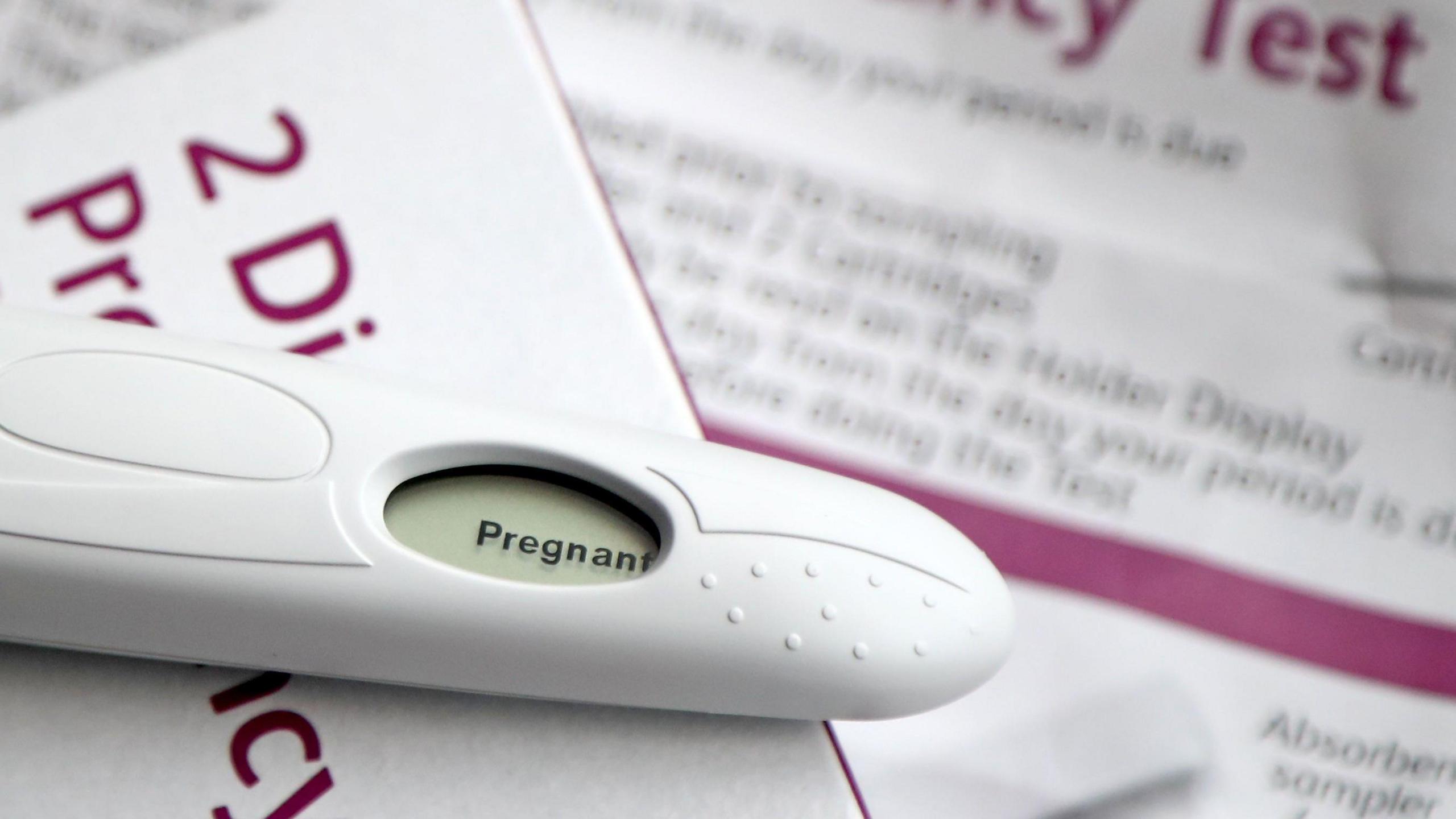 A positive pregnancy test.