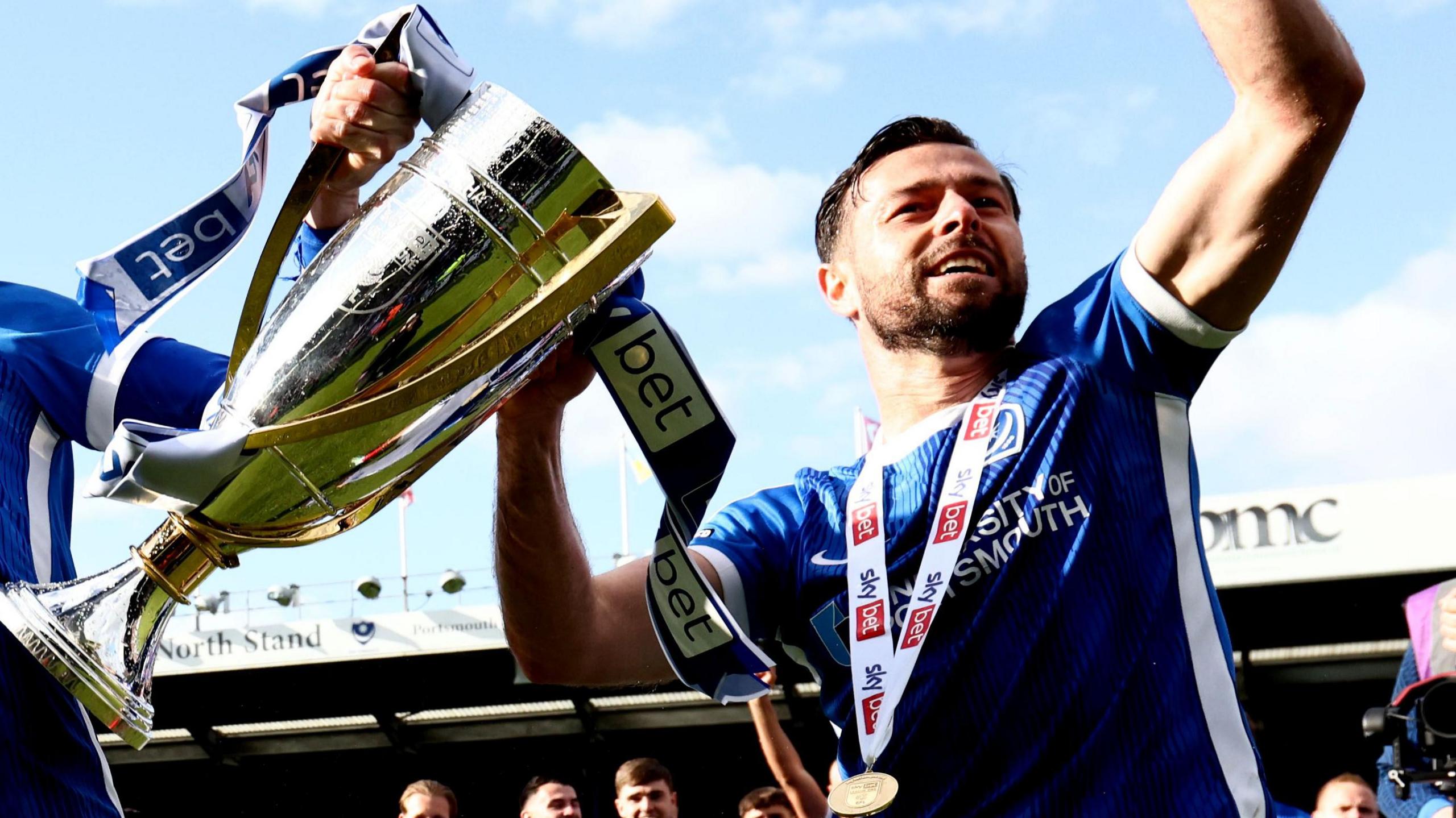 Joe Rafferty celebrates promotion with Portsmouth