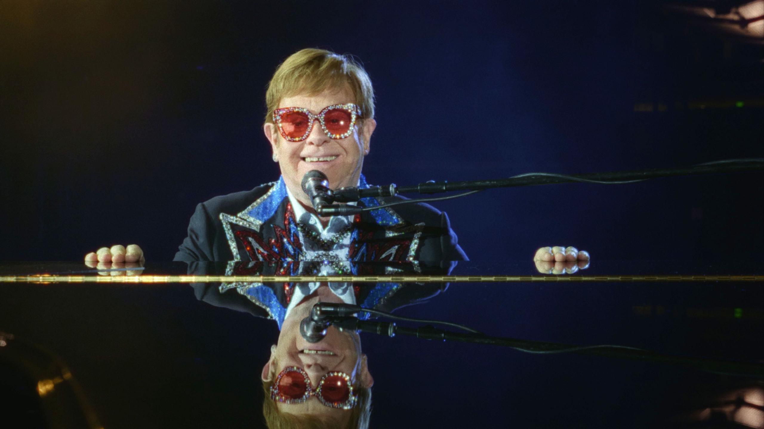 Sir Elton John takes a moment to enjoy his final concert tour performance at Dodger Stadium on November 20, 2022