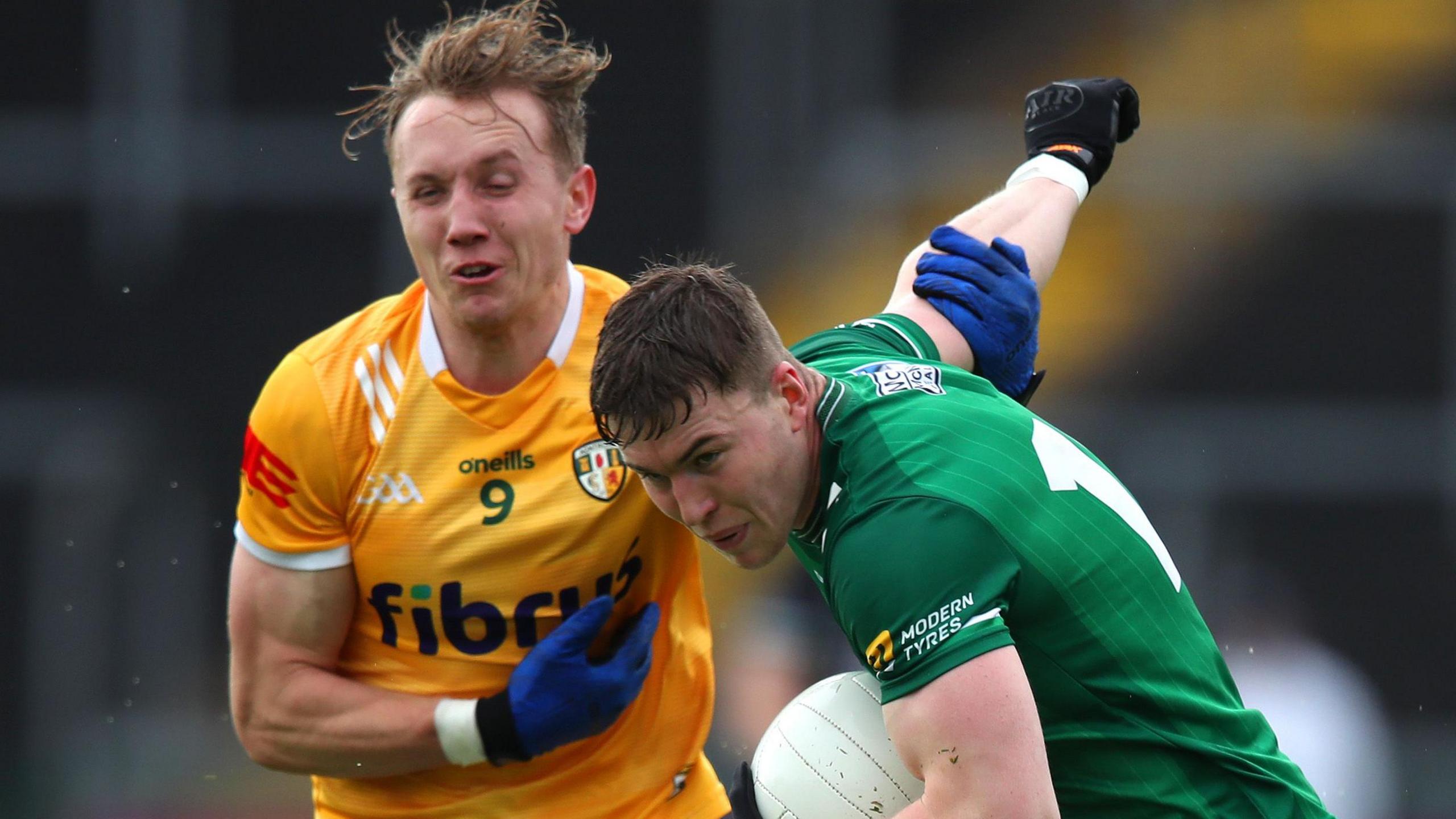 Cathal Hynds tackles Ronan McCaffrey