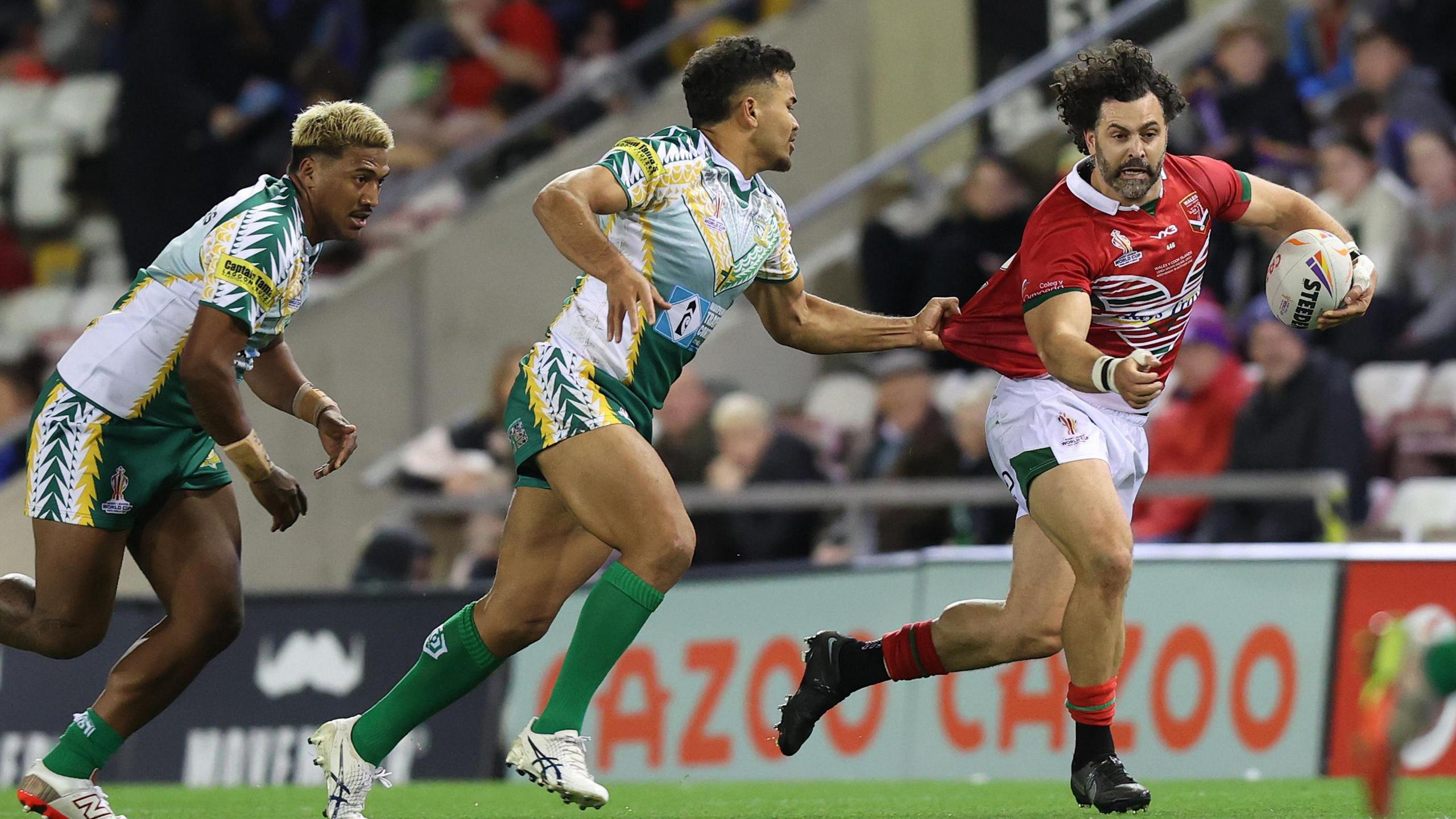 Rhys Williams on the run for Wales against Cook Islands at the 2022 World Cup