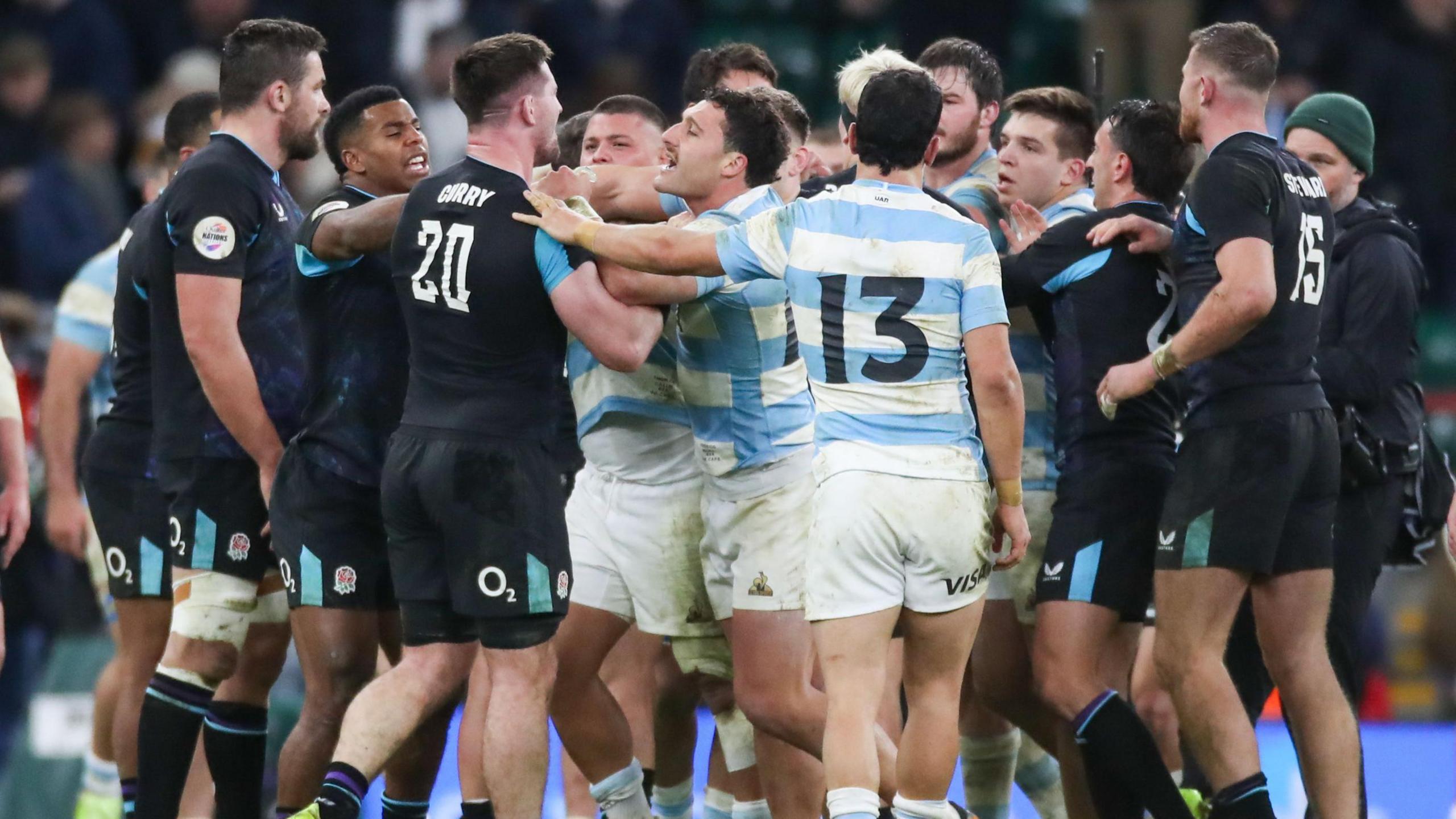 England and Argentina players tussle
