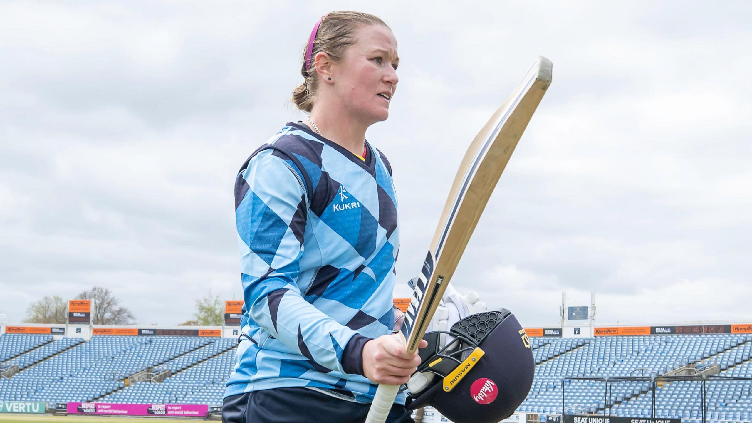 Hollie Armitage raises her bat