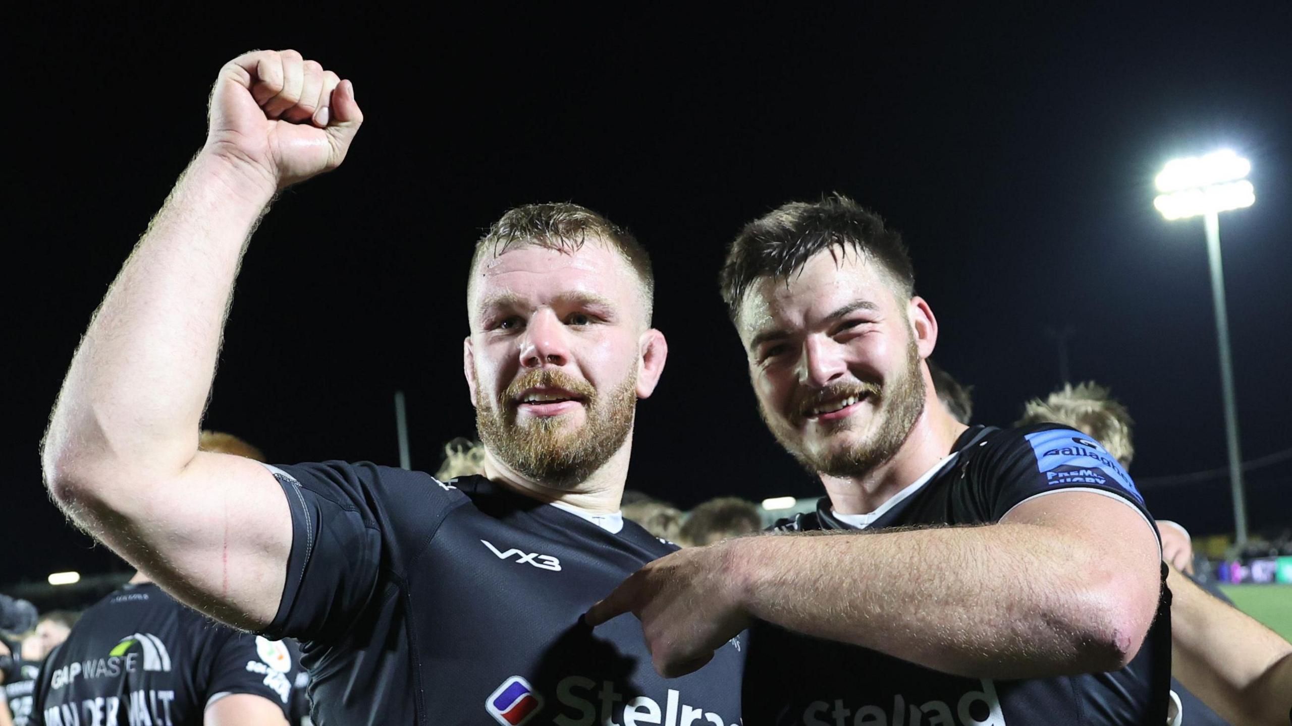 Callum Chick (left) and Pedro Rubiolo celebrate Newcastle's win over Exeter