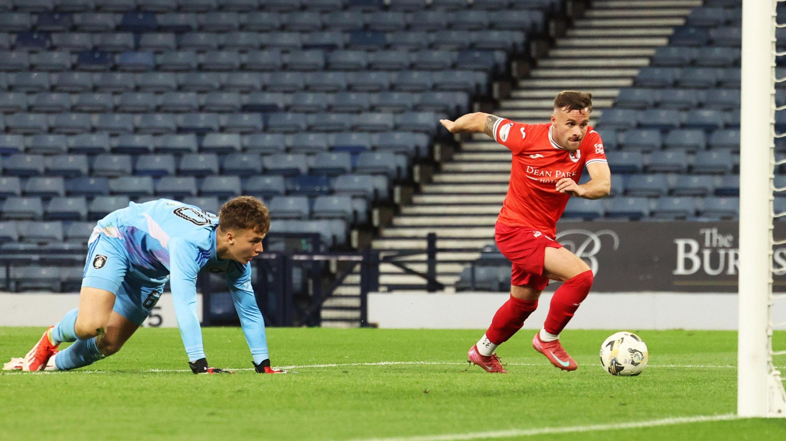 Raith Rovers' Lewis Vaughan (right) scores