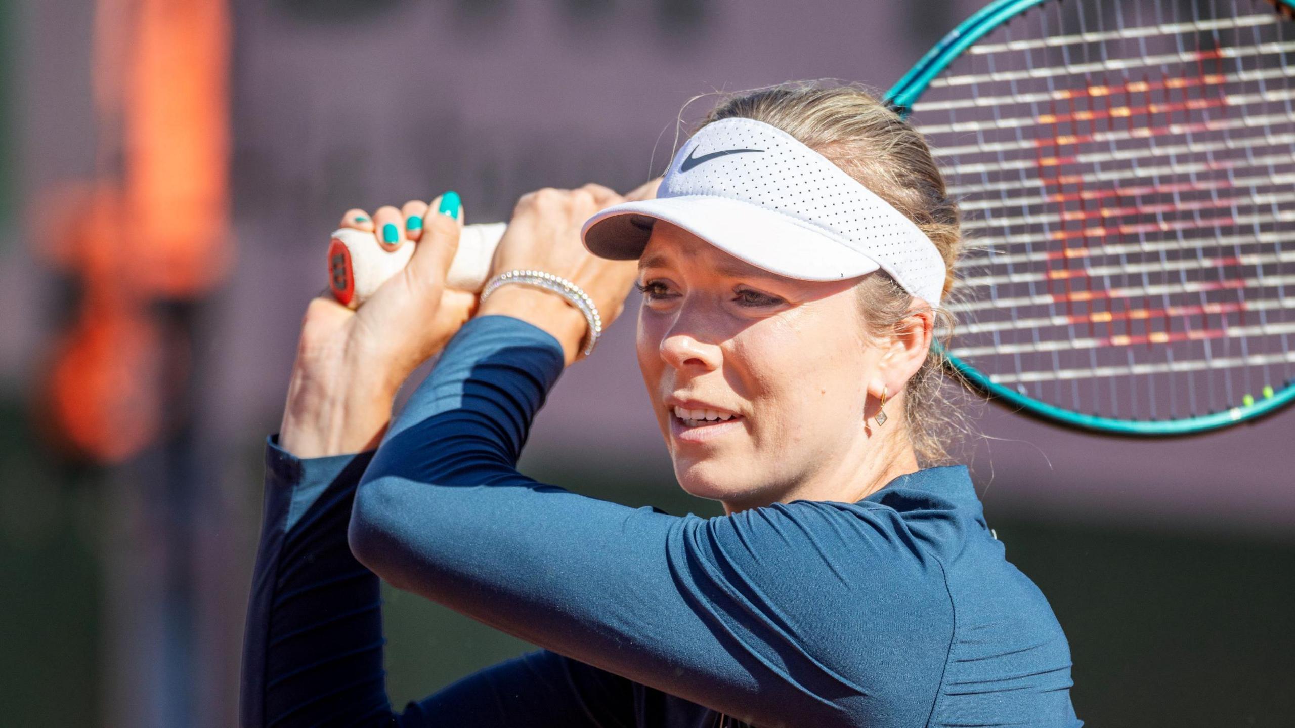 Katie Boulter hits a return during French Open practice