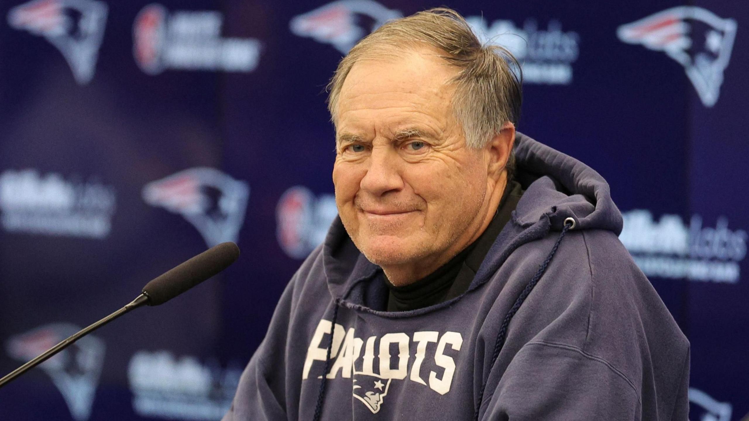 New England Patriots head coach Bill Belichick smiles at a news conference in Frankfurt in 2023