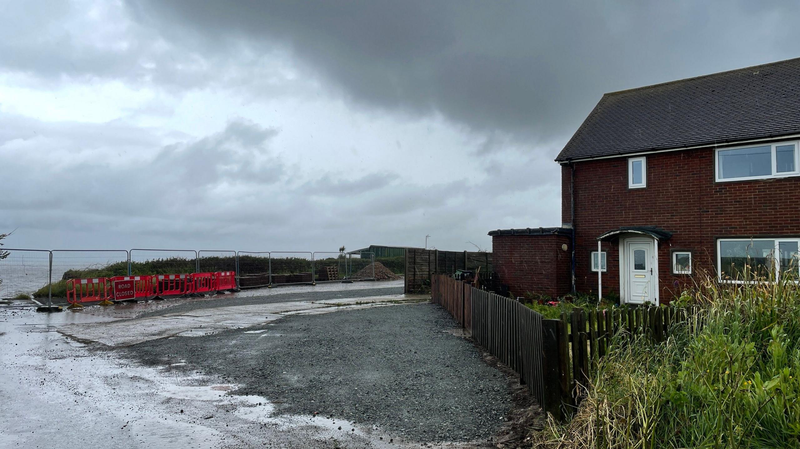 House with safety fence nearby