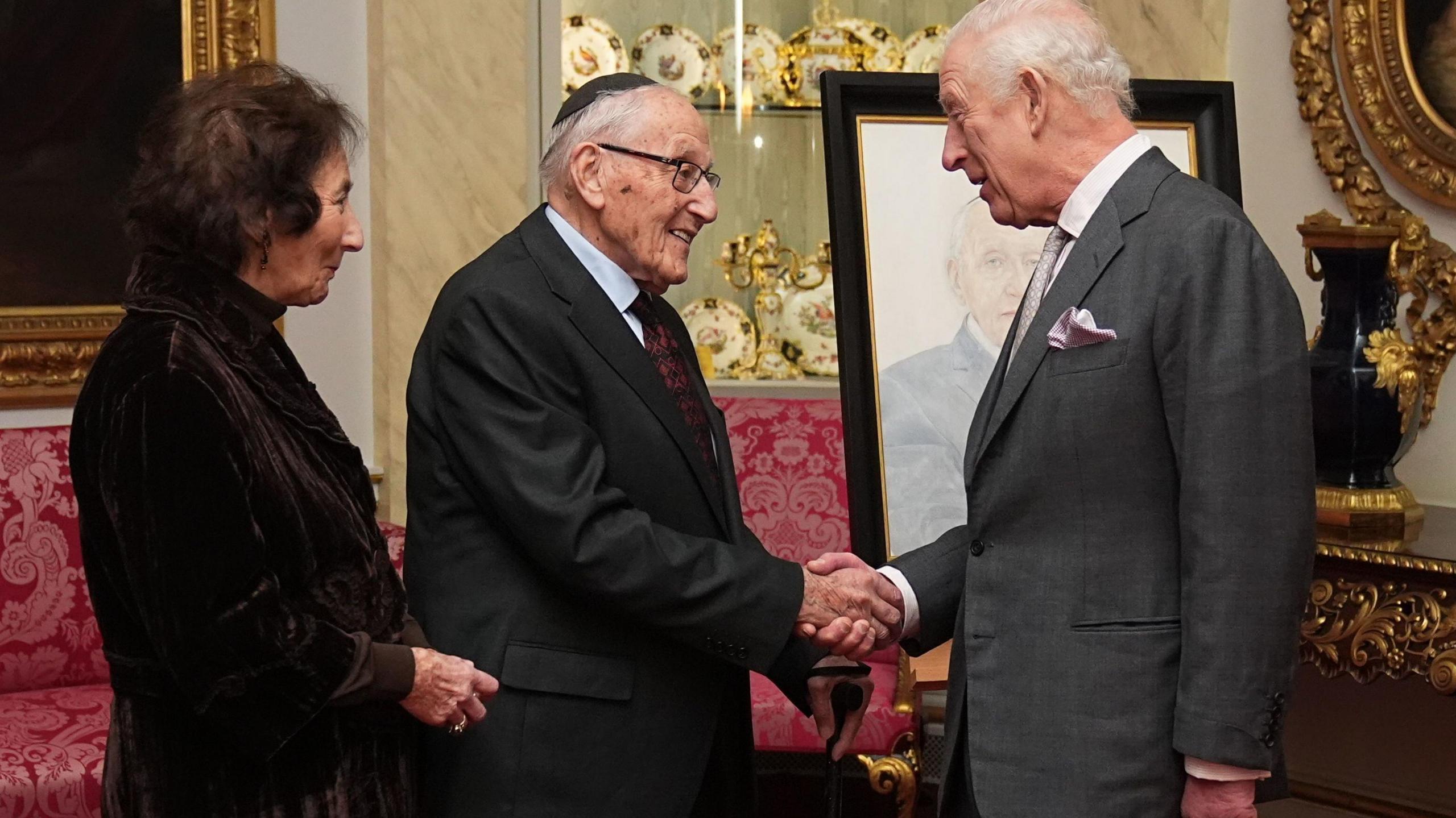 King Charles with Holocaust survivor Manfred Goldberg and his wife Shary