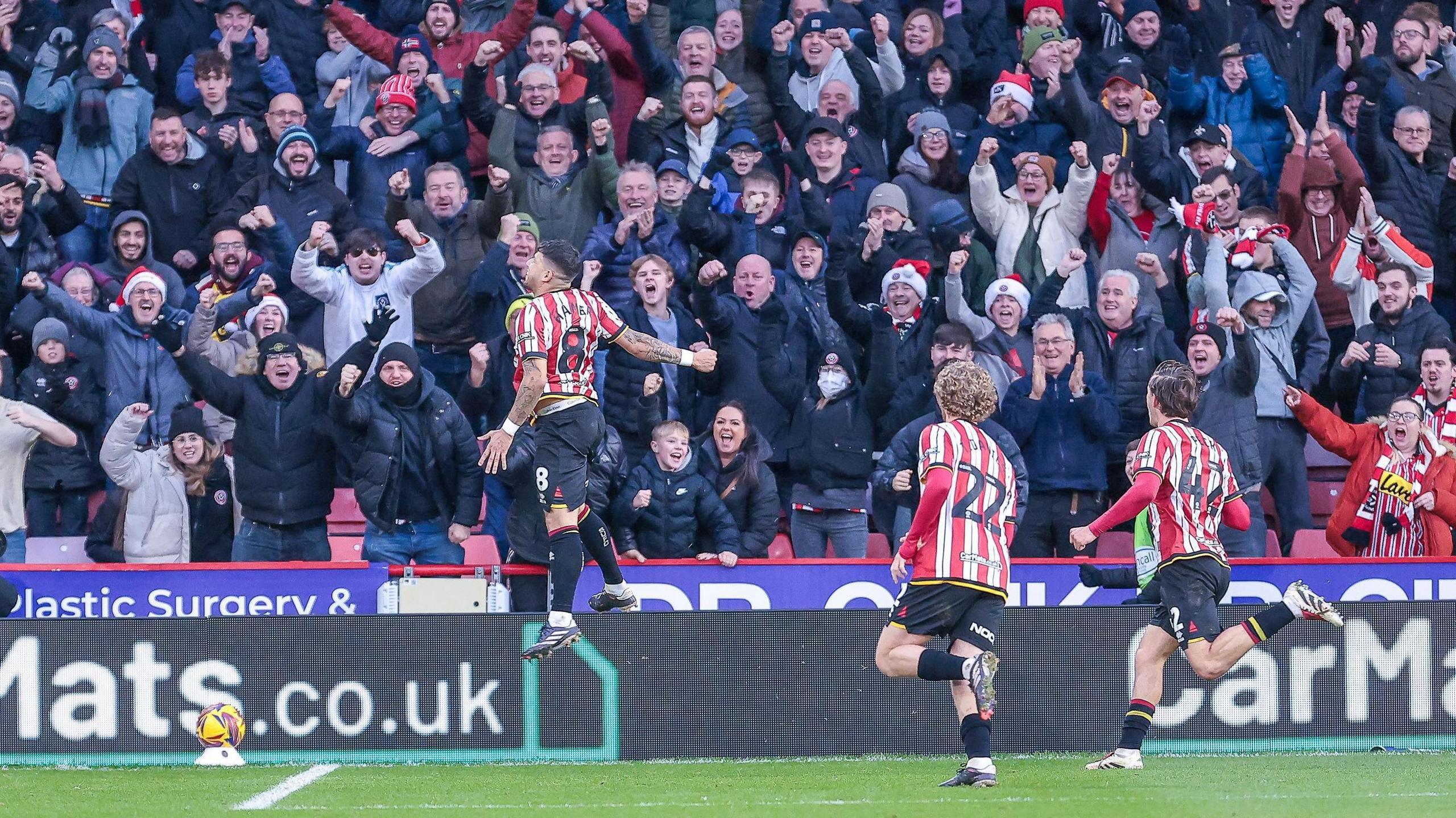 Gustavo Hamer celebrates after opening the scoring for Sheffield United