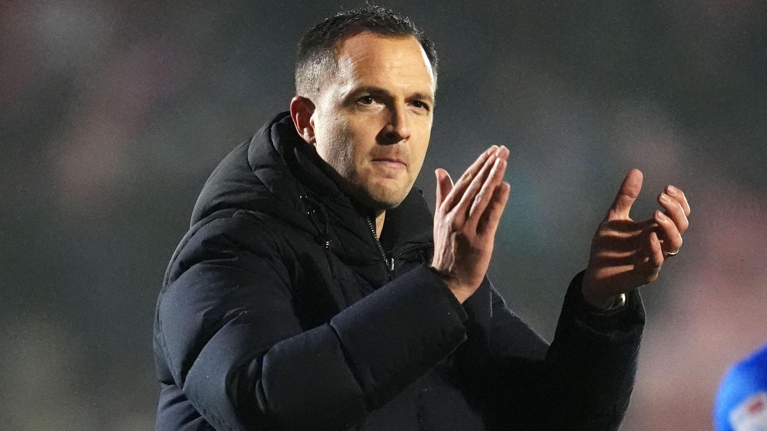 Chris Davies applauds Birmingham's travelling fans after their 1-0 win at Crawley