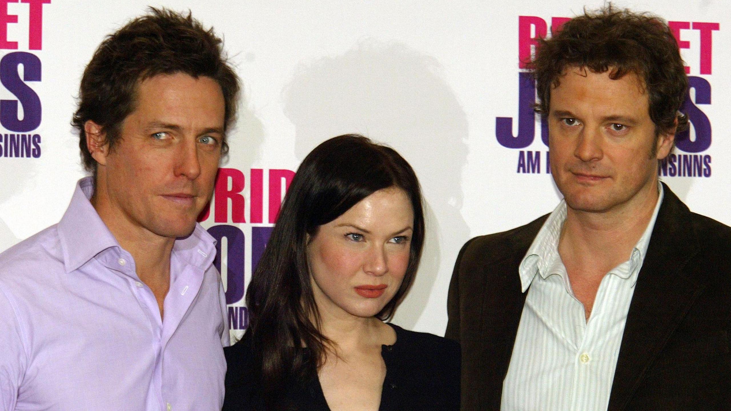 Hugh Grant, Renee Zellweger and Colin Firth during "Bridget Jones : The Edge of Reason" Berlin Photocall at Hotel Adlon in Berlin, Germany