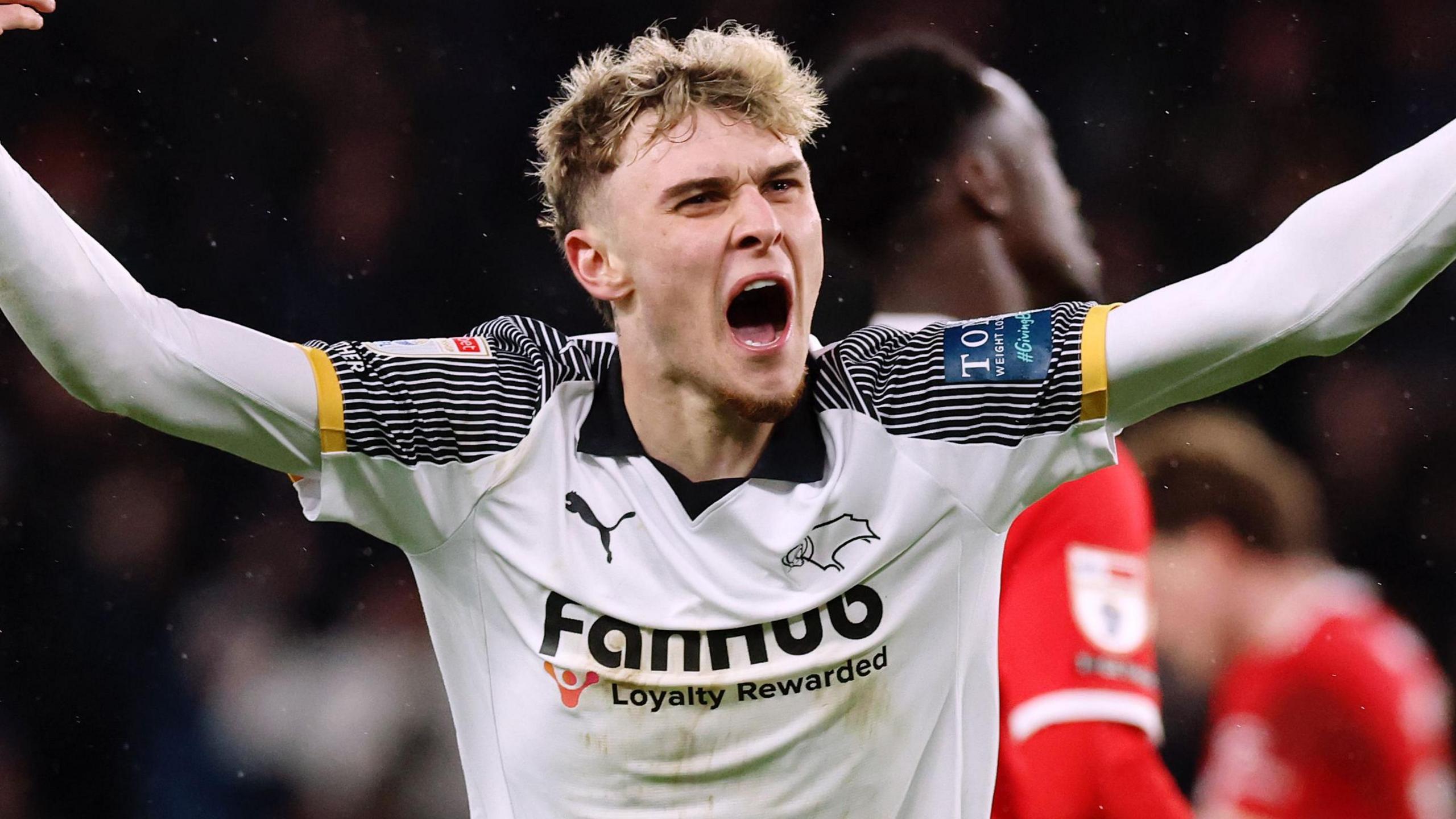 Derby County's Bobby Clark with his arm outstretched celebrating his goal against Middlesbrough