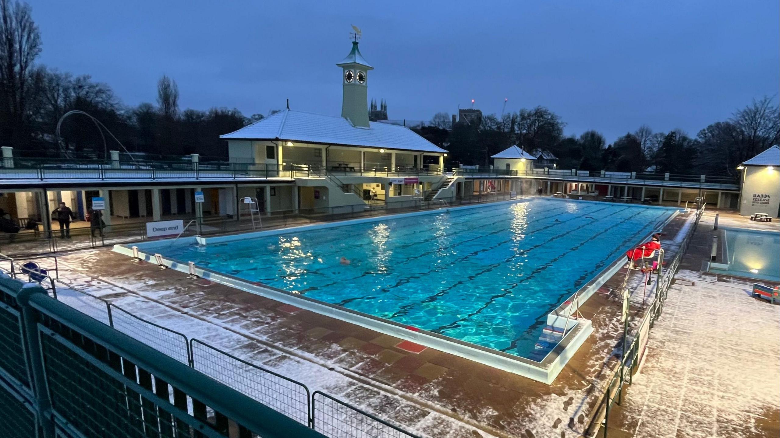 Snow around the swimming pool