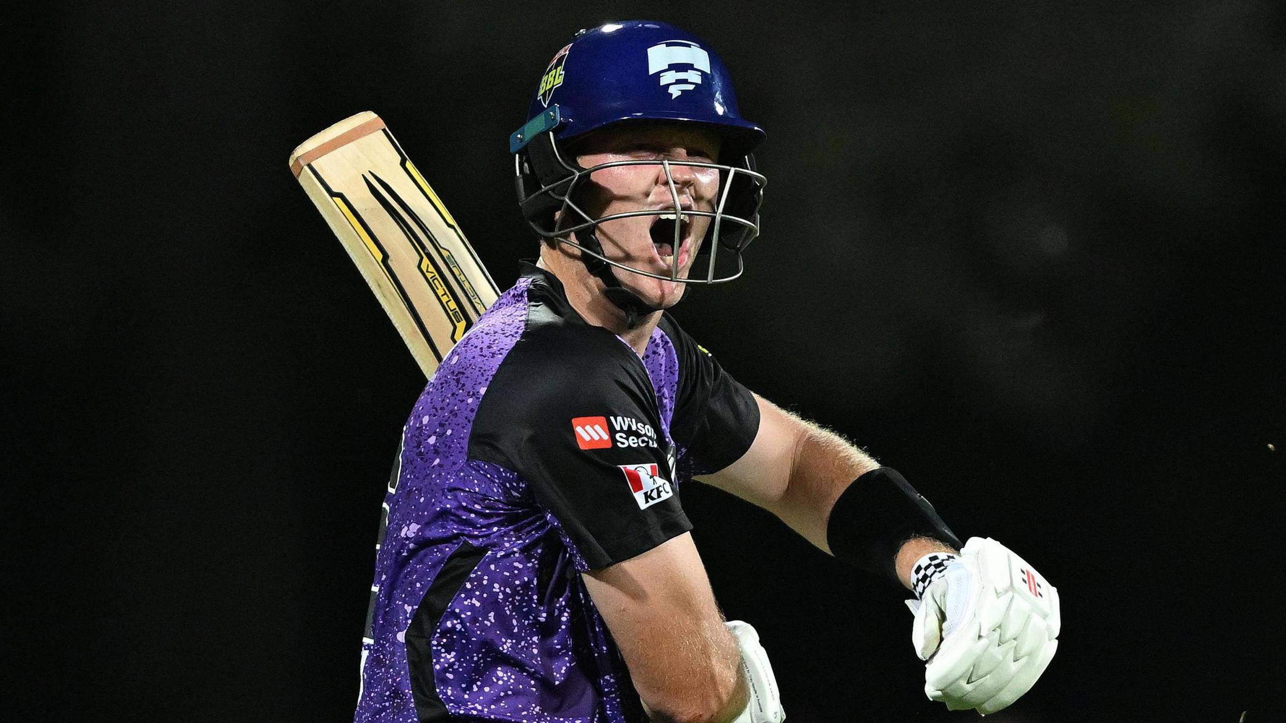 Mitchell Owen celebrates his hundred for Hobart Hurricanes