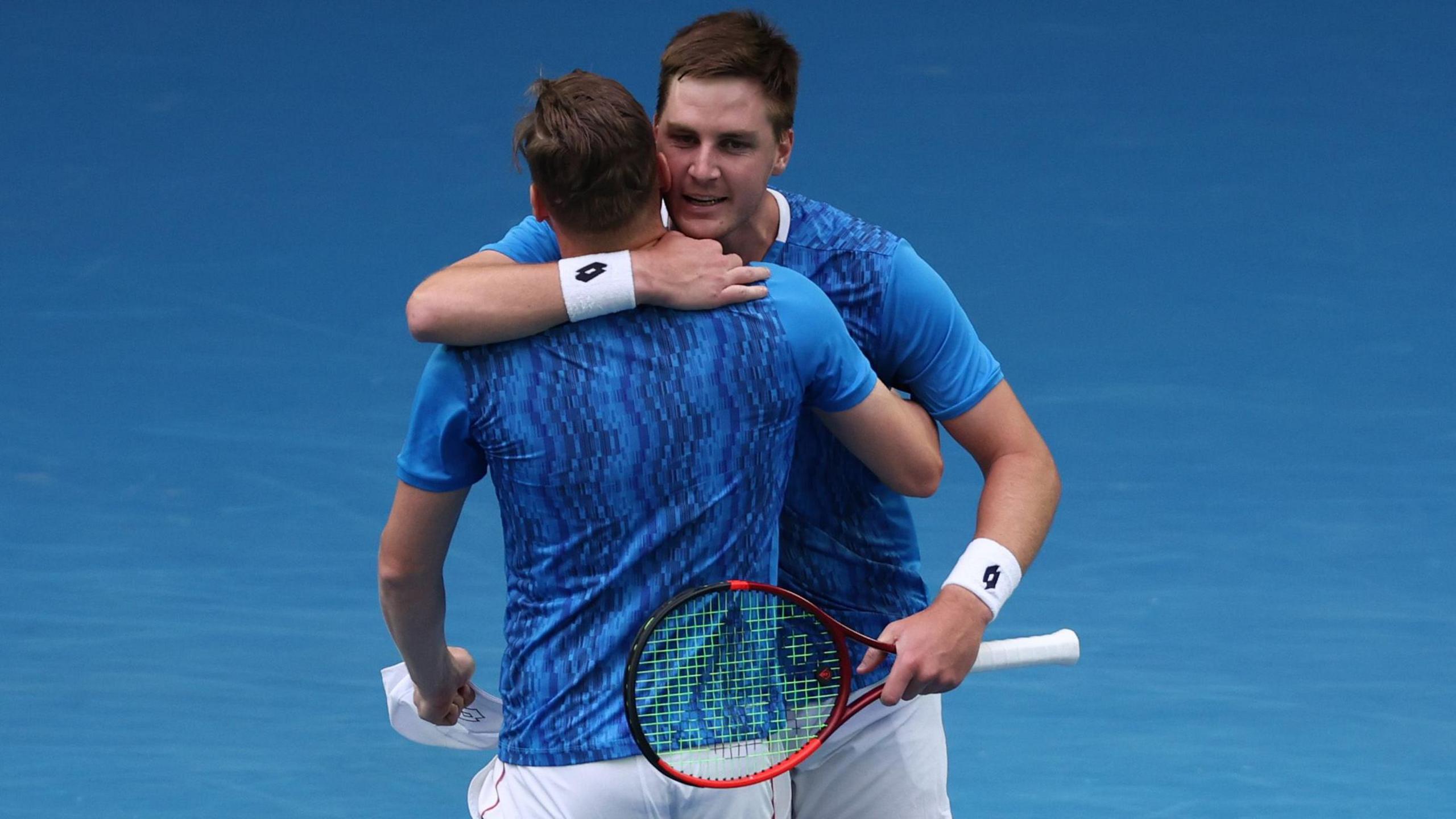 Henry Patten and Harri Heliovaara hug each other following their semi-final win at the Australia Open