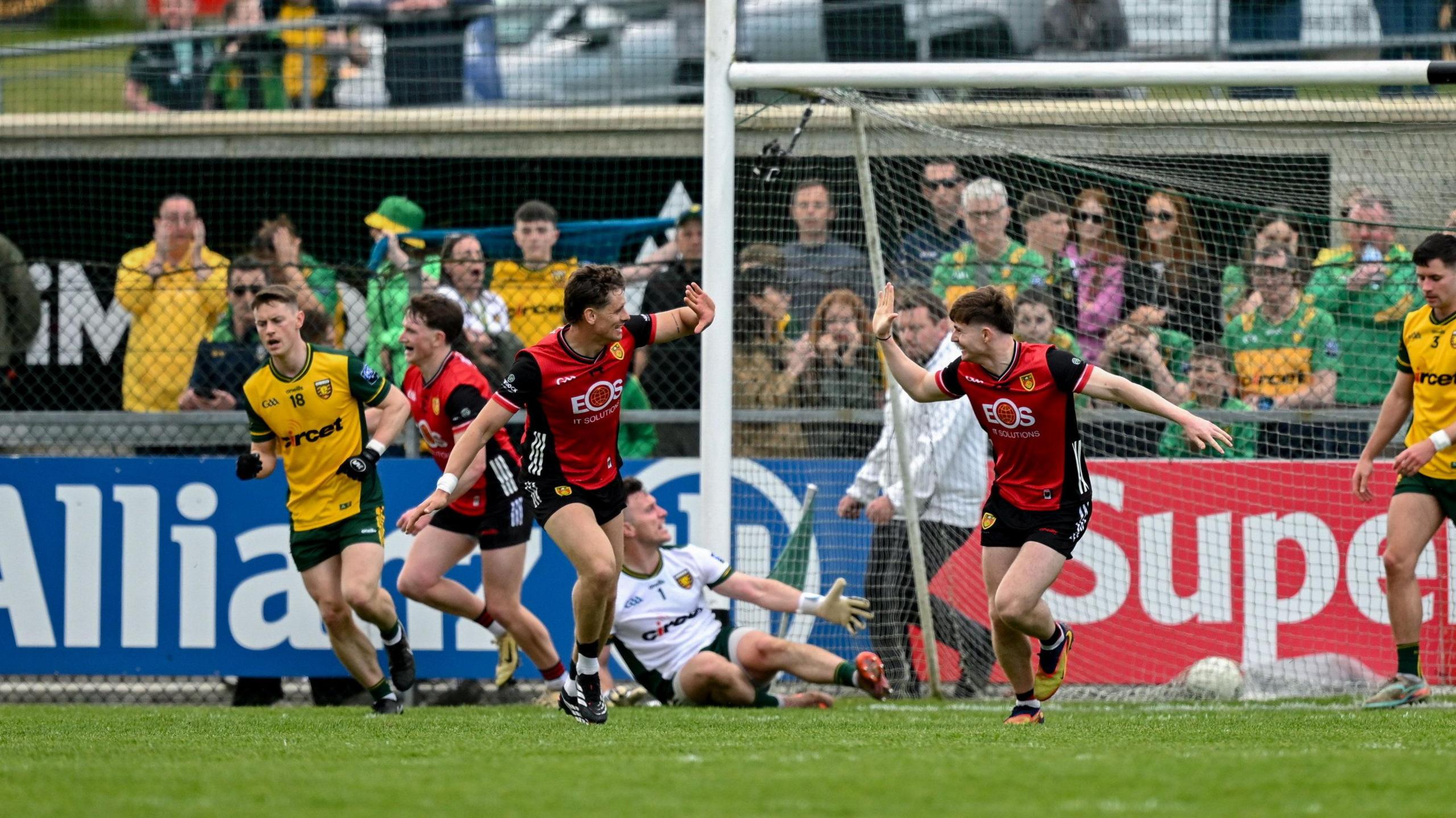 Down celebrate a goal 