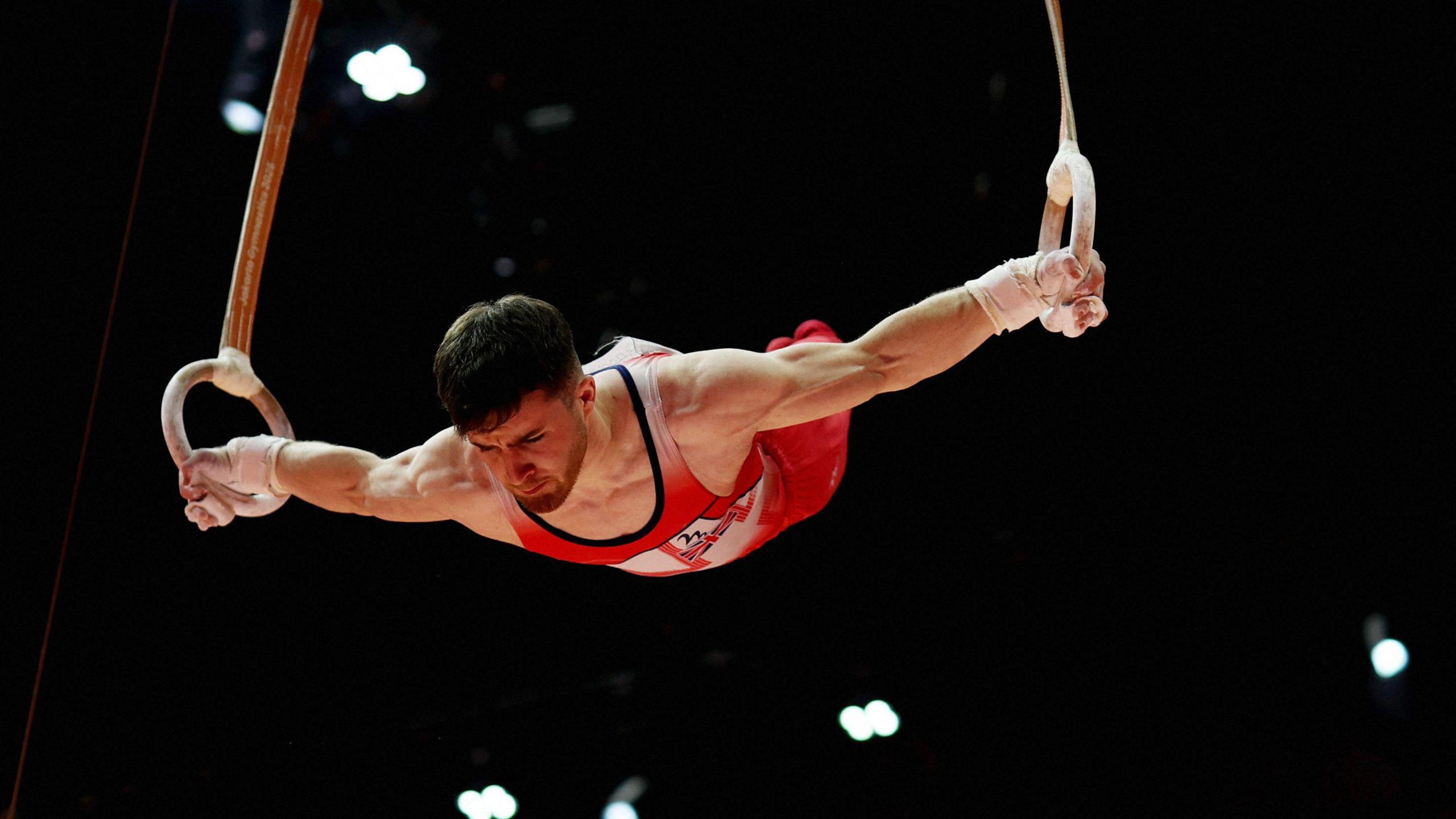 Harry Hepworth competing in the men's rings qualifiers