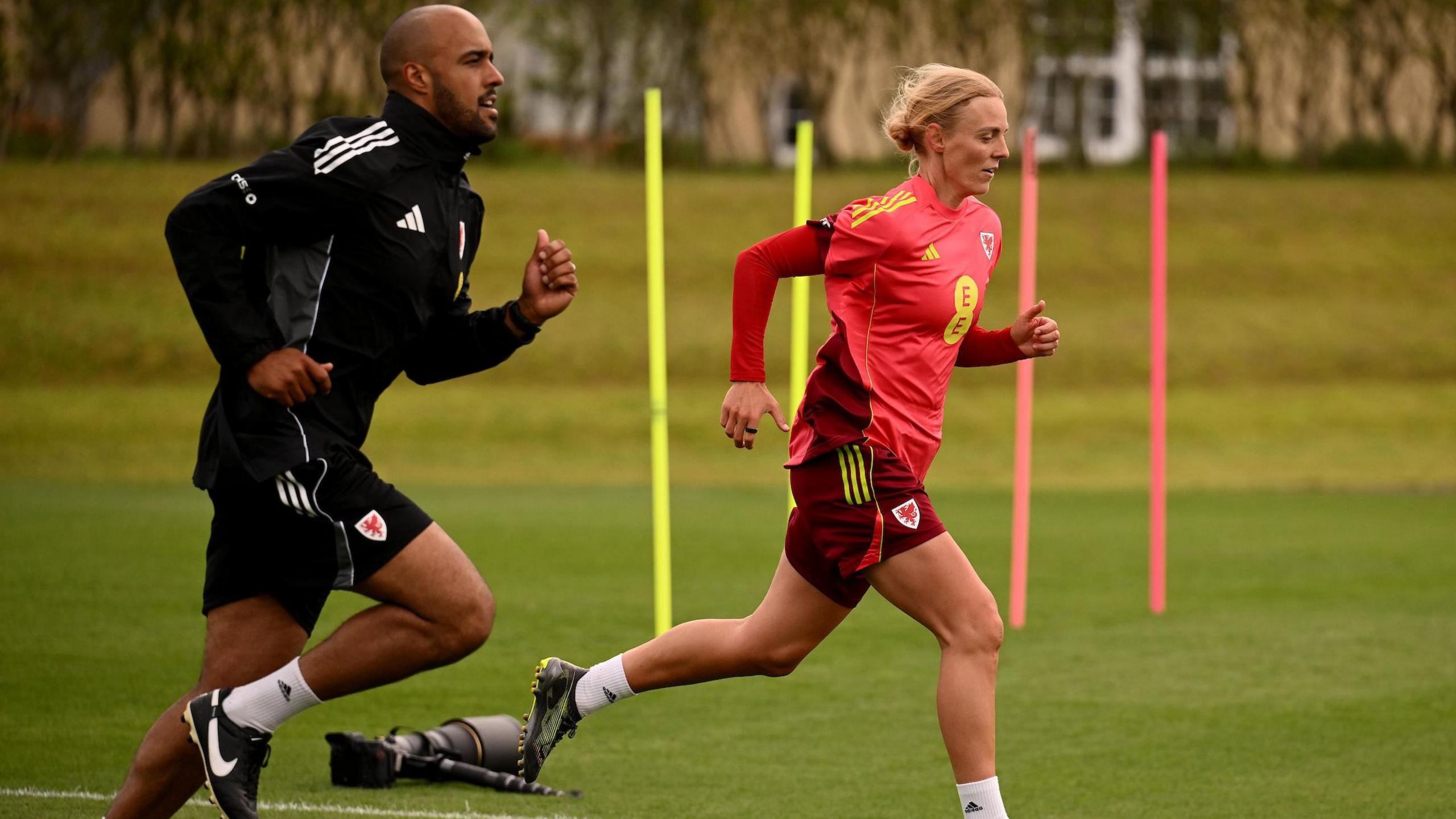 Wales' Sophie Ingle and performance coach Dan Gordon during a training session at the Vale Resort in Cardiff