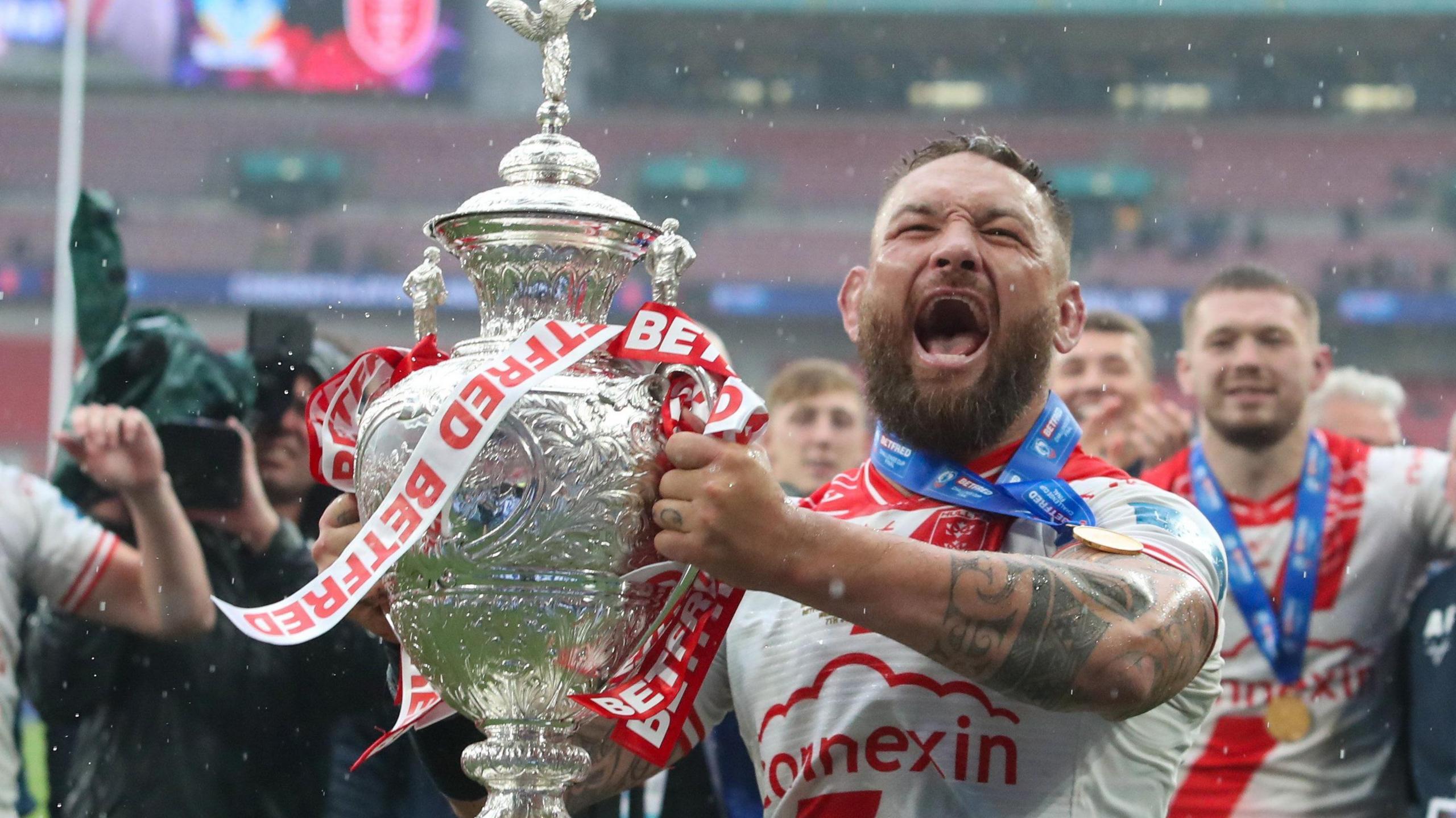 Jared Waerea-Hargreaves celebrates Hull KR's Challenge Cup final win with the trophy