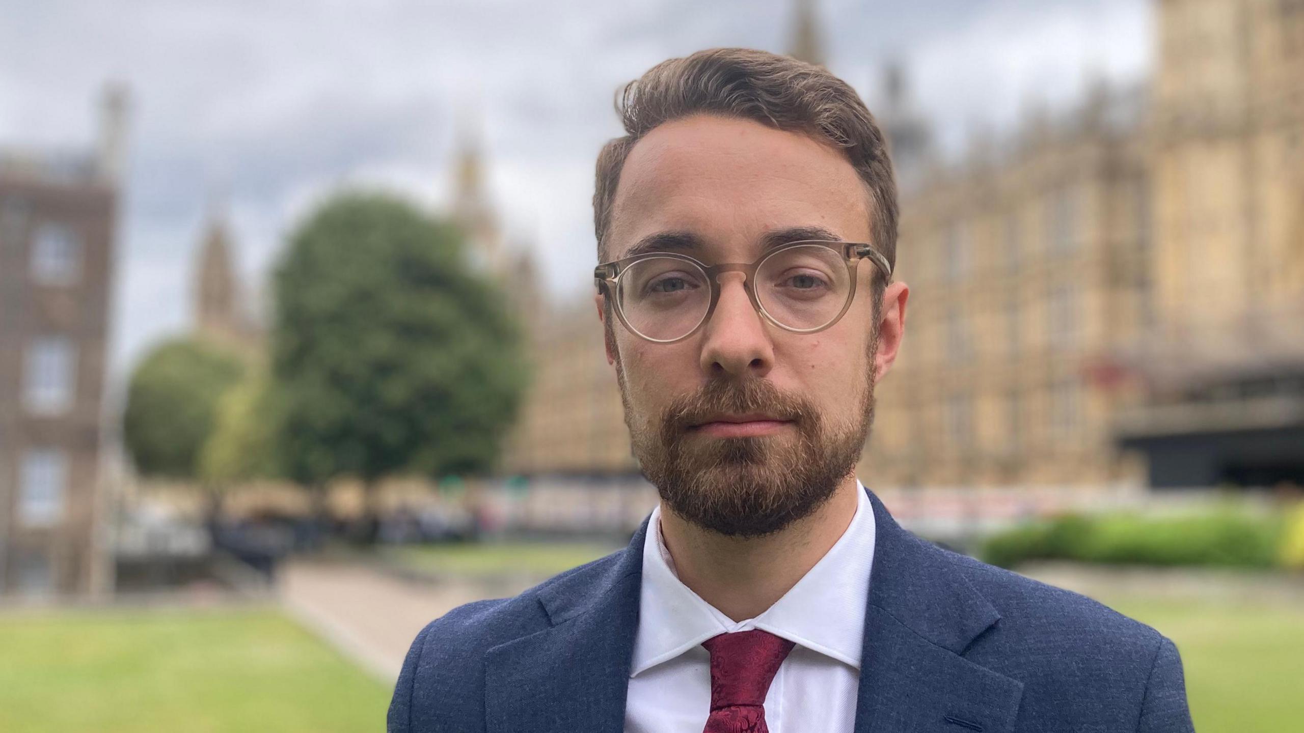 MP Luke Charters in front of Parliament