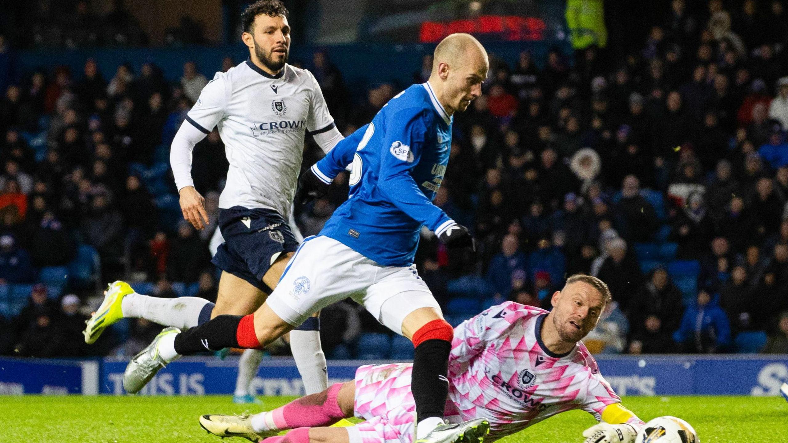 Rangers' Vaclav Cerny gets around Dundee's Trevor Carson to score to make it 1-0 during a William Hill Premiership match between Rangers and Dundee at Ibrox Stadium