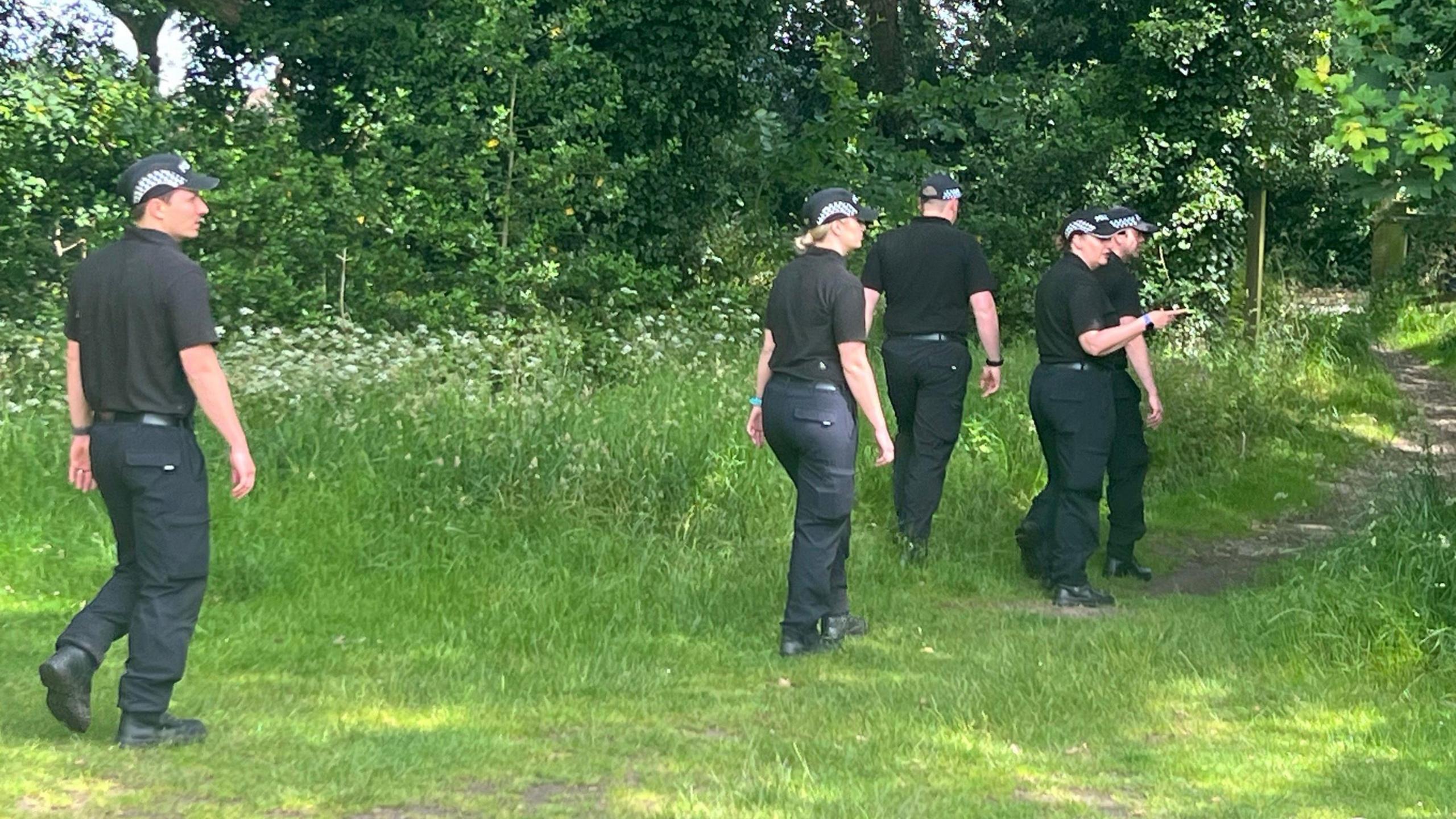 Norfolk Police searching the woodland