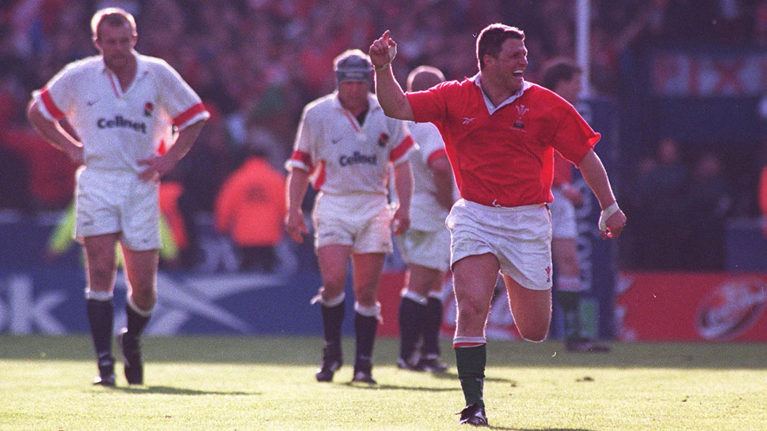 Scott Gibbs celebrates the 1999 win against England