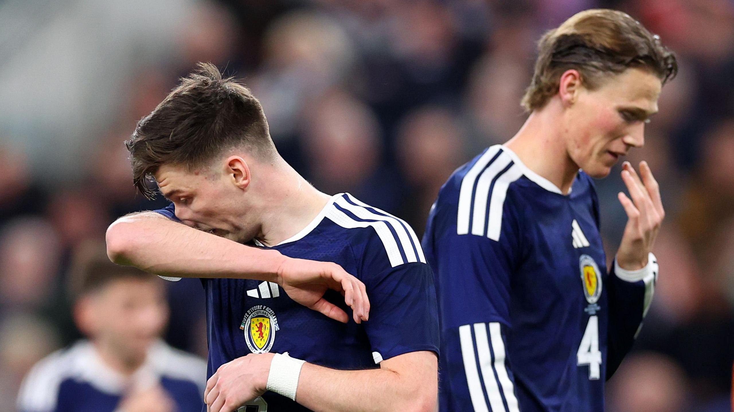 Scotland's Kieran Tierney and Scott McTominay look dejected