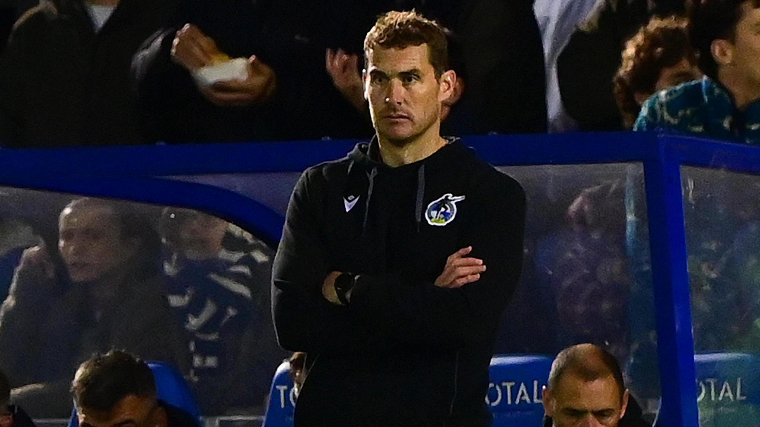 Matt Taylor standing in the dugout during Bristol Rovers' win against Charlton