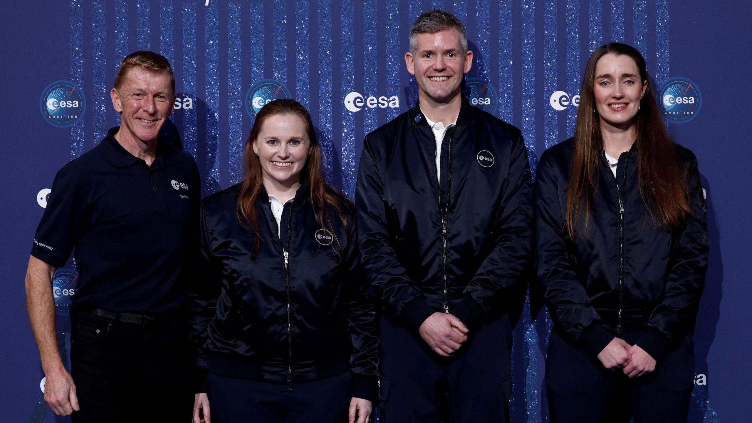 British astronaut Major Tim Peake, ESA Astronaut Class of 2022 Meganne Christian, ESA's British astronaut John McFall and ESA Astronaut Class of 2022 Irish Rosemary Coogan pose during a ceremony to unveil the European Space Agency five new class of career astronauts in Paris